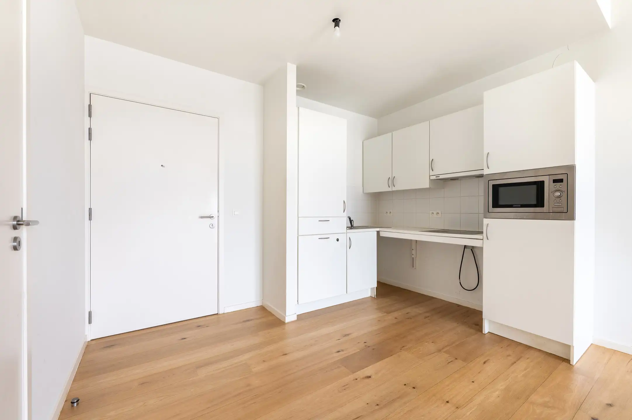 Lichtrijk appartement met terras en EPC A foto 6