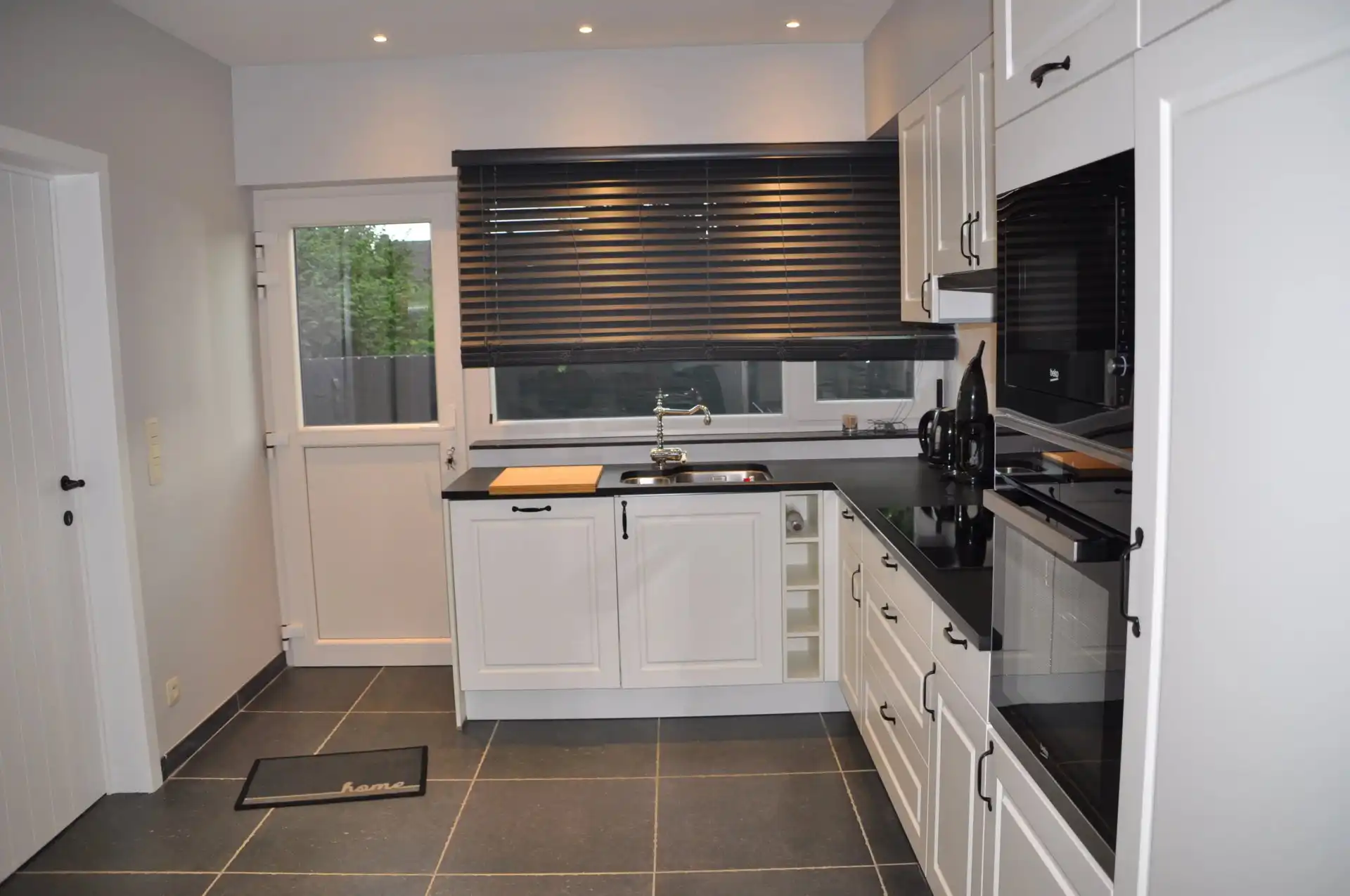 TIJDLOZE GERENOVEERDE WONING MET 2 SLPK’S IN RUSTIGE BUURT IN VELDWEZELT foto 10