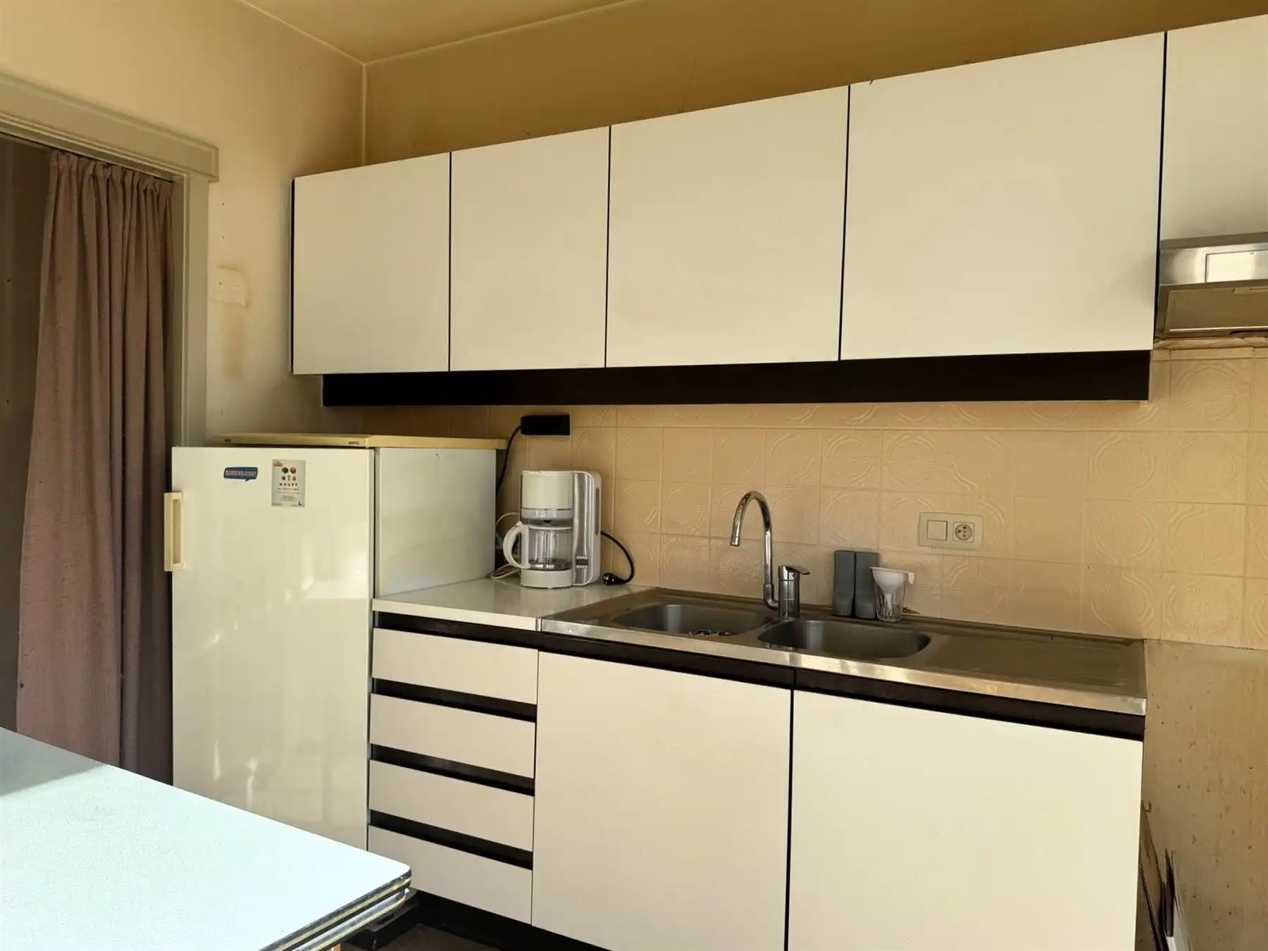 Gelijkvloerse woning met zonnige tuin in rustige woonbuurt foto 6