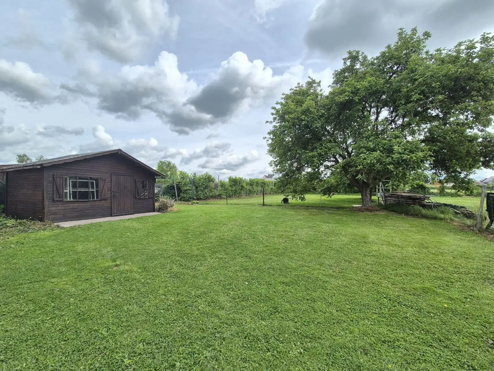 Open bebouwing met 3 slaapkamers, tuin en garage foto 13