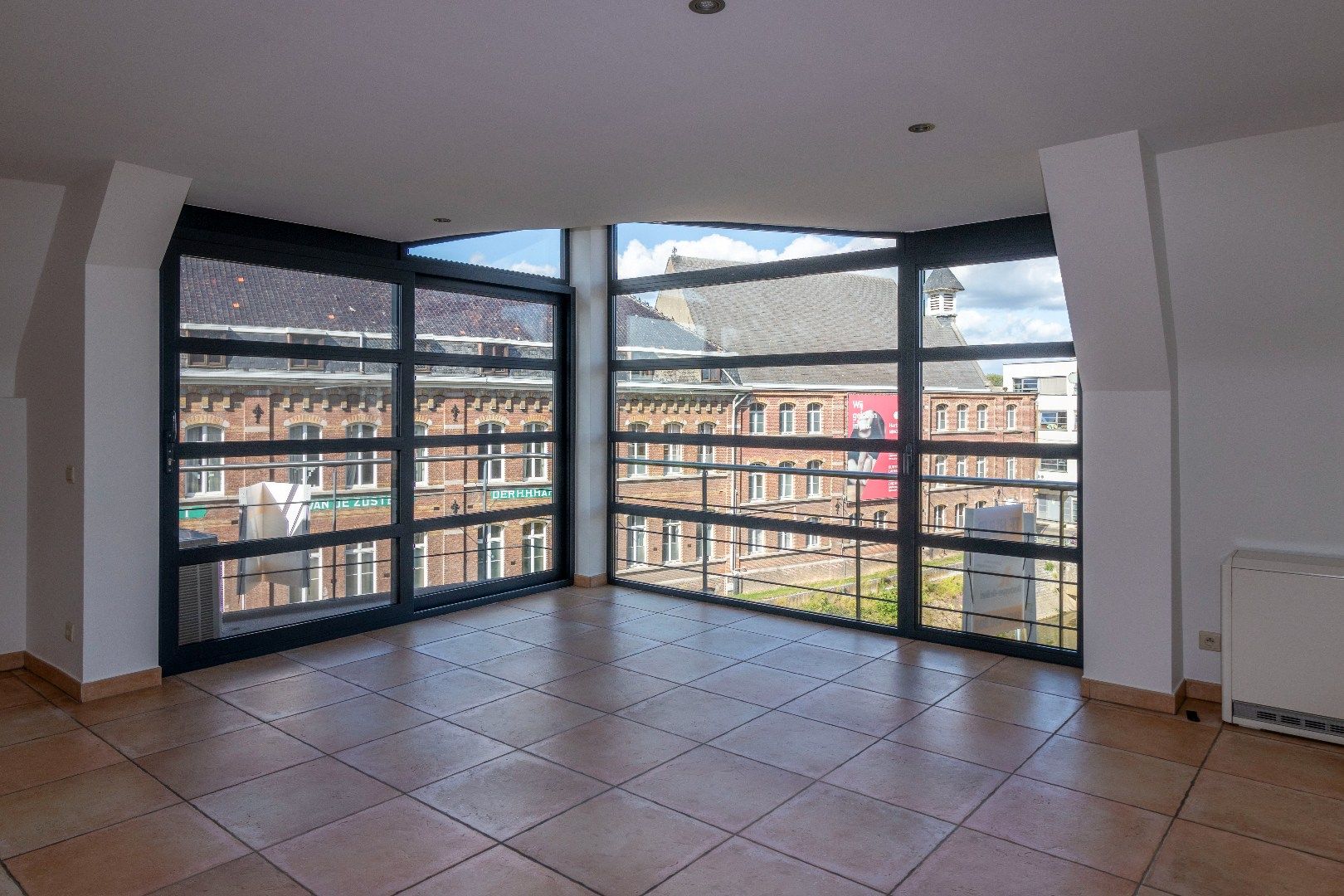 Duplex met 2 slpks en 2 badk in het centrum van Ninove foto 2
