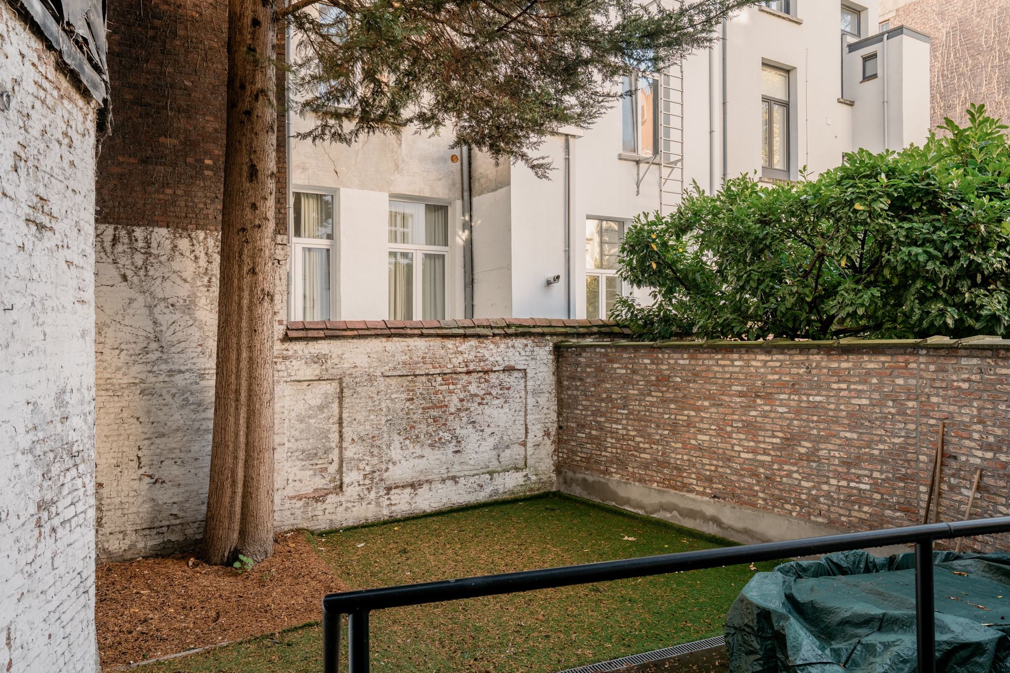 Gelijkvloers appartement met zuid georiënteerde tuin aan het oude Gerechtshof foto 3