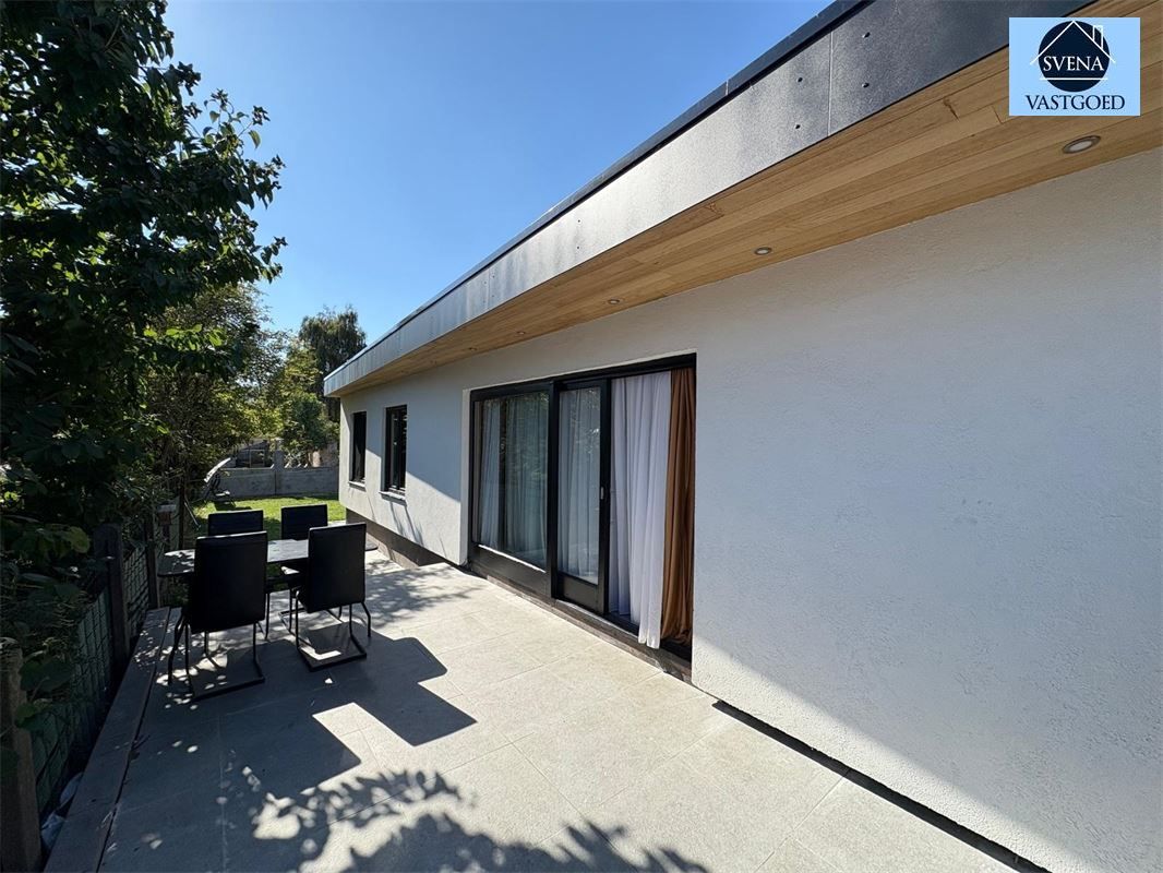 WONING MET HANDELSRUIMTE EN 3 SLAAPKAMERS foto 2