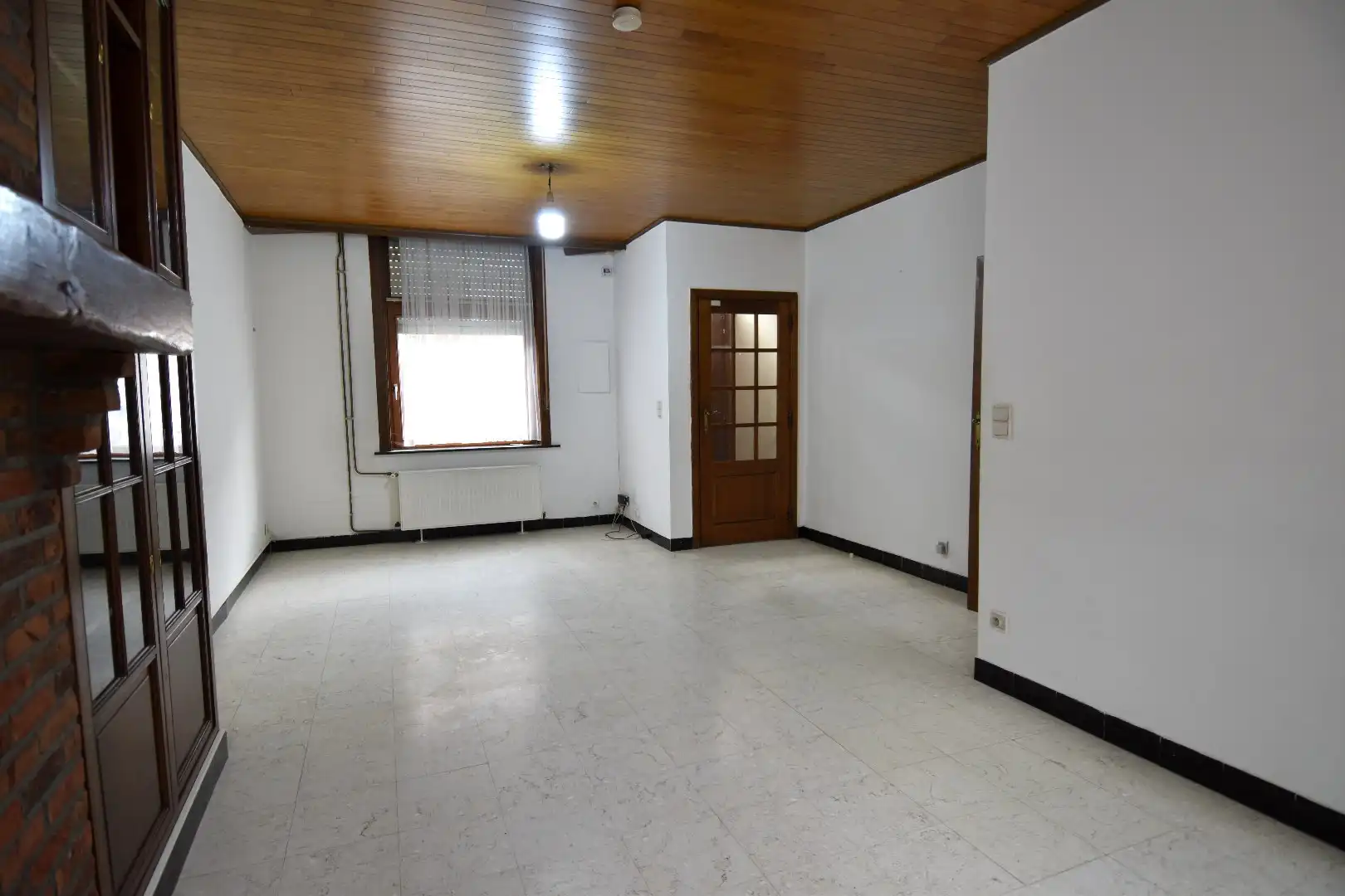 Ruime 3-slaapkamerwoning met bovenliggend appartement (woning) te koop in centrum-Kortrijk foto 3