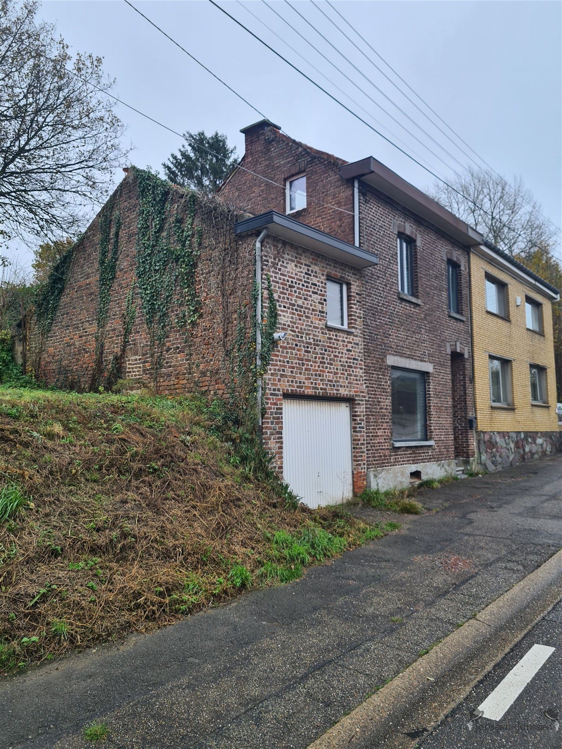 Op te knappen woning met veel potentieel in Tongeren foto 2