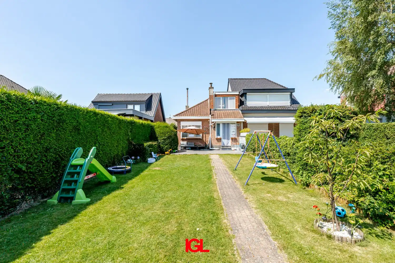 3-gevel woning met zuidgerichte tuin en garage foto 18