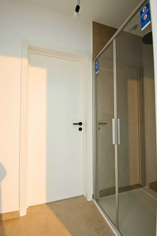 Ruime nieuwbouwwoning met 4 slaapkamers, garage en tuin nabij het centrum van Sint-Pieters-Leeuw foto 9