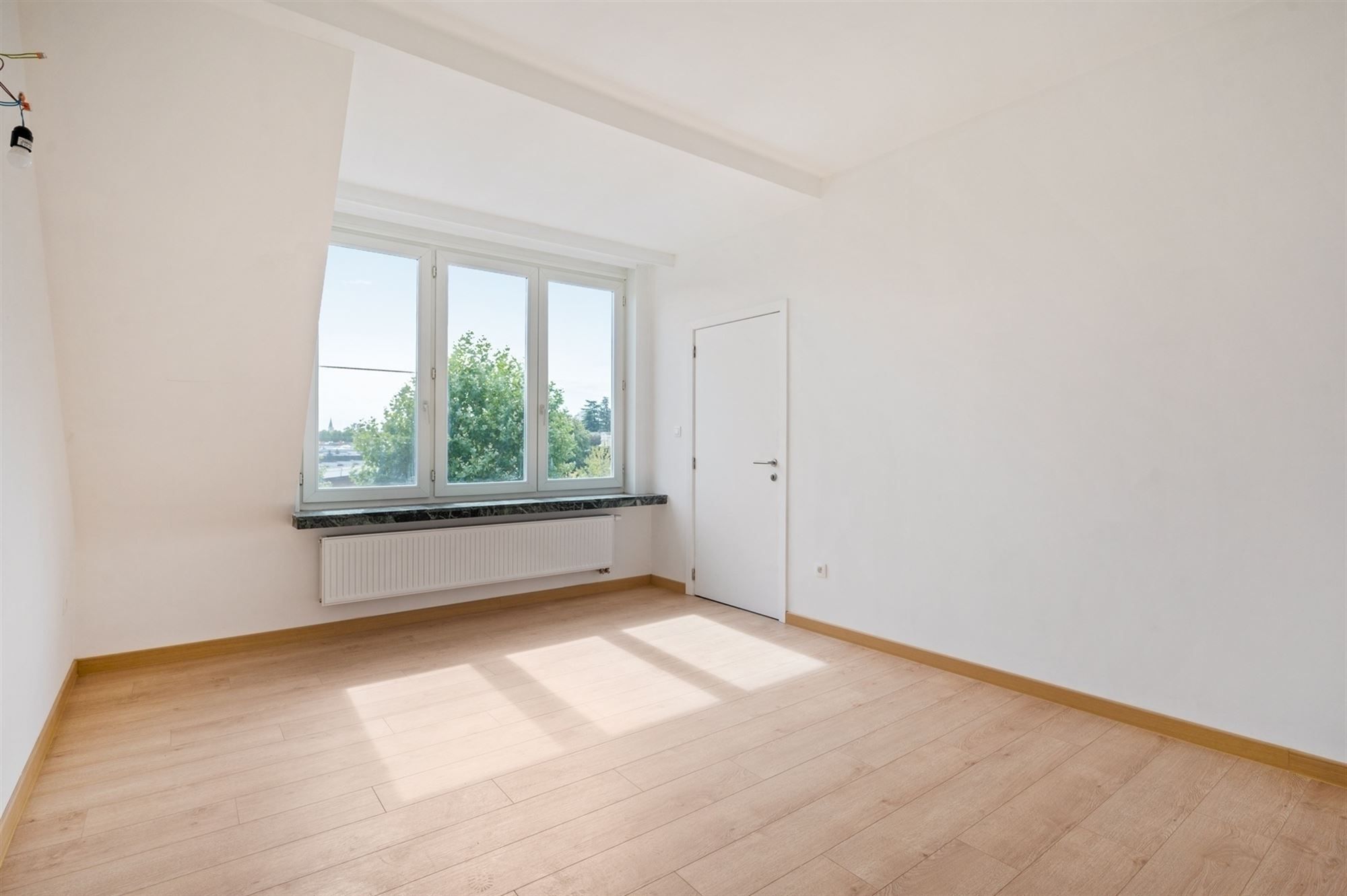 Gerenoveerd en lichtrijk appartement te Mechelen foto 4