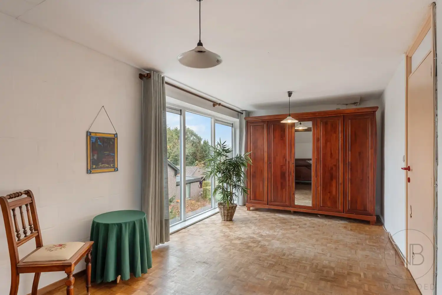 Pand met vergunde praktijkruimte, woonst, garage en carport in Opglabbeek foto 13