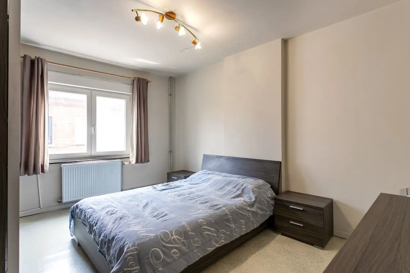 Energiezuinige woning met 2 slpk + zolder en tuin foto 11