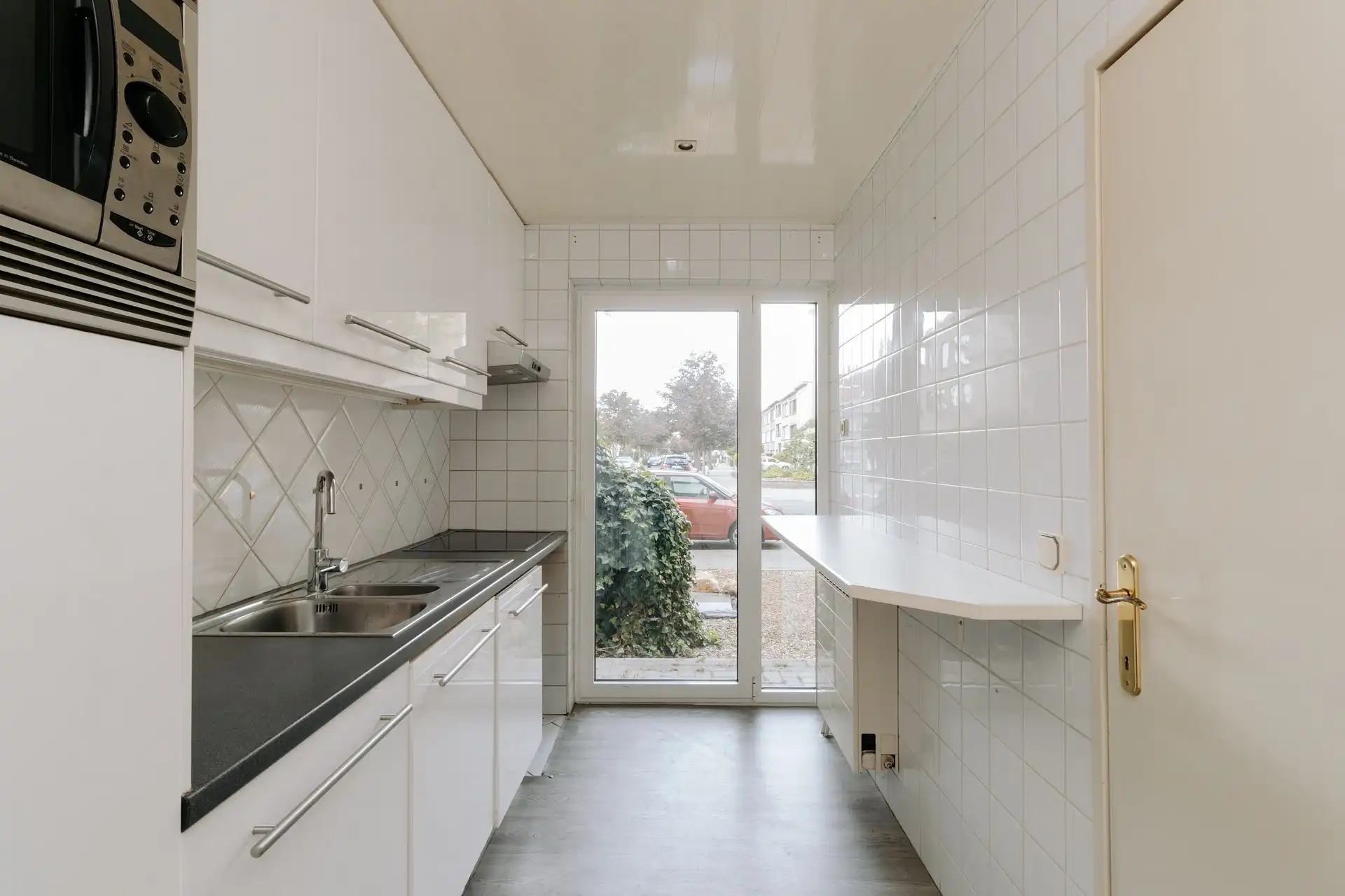 Gelijkvloers appartement met tuin in de vogeltjeswijk foto 4