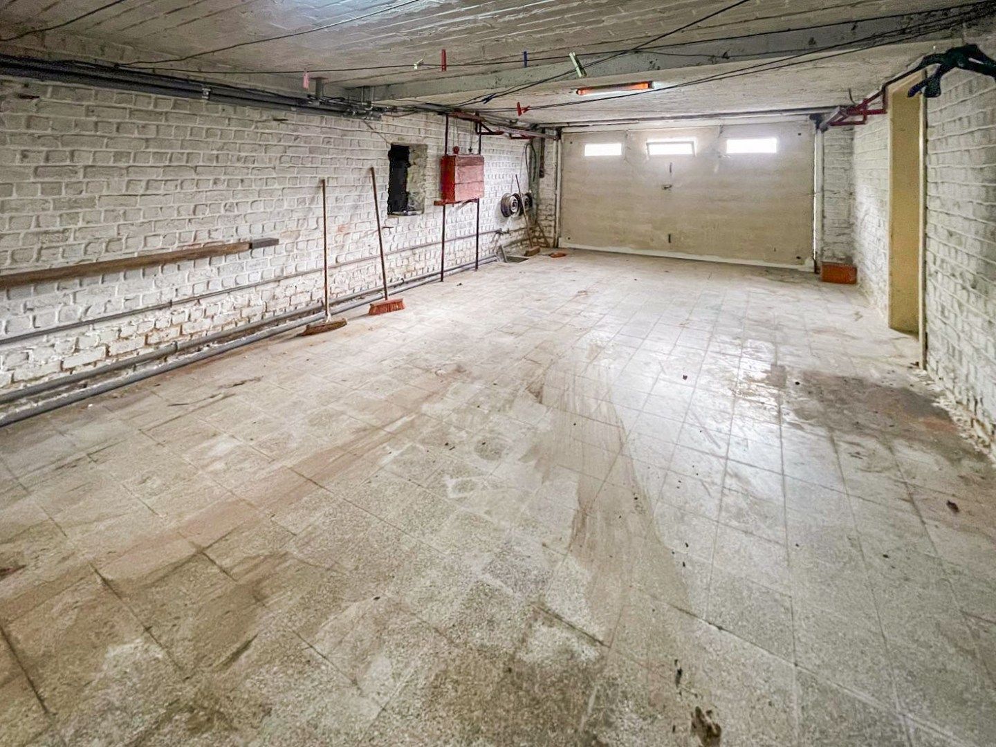 Te renoveren viergevelwoning met tuin foto 11