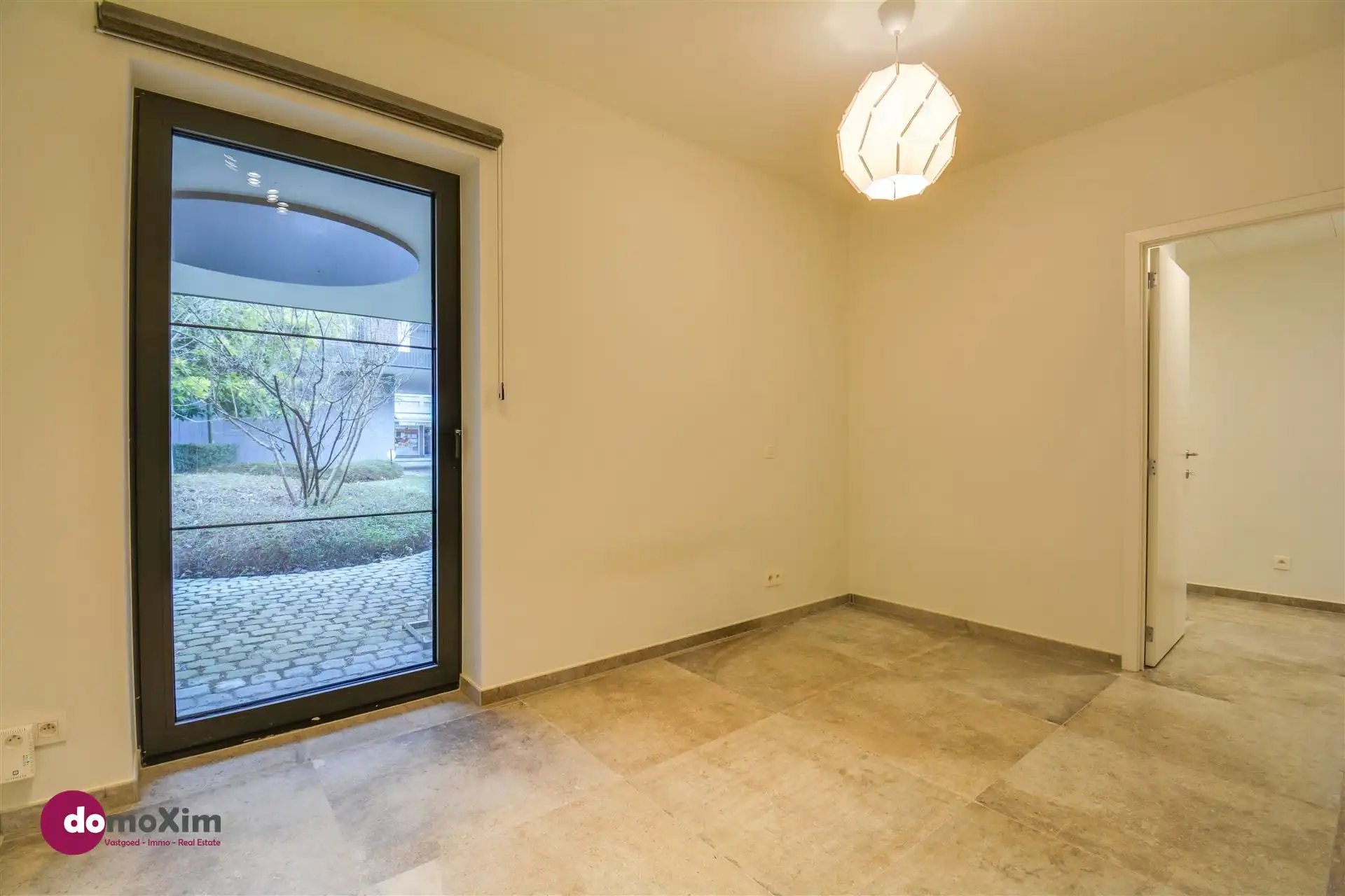 Gelijkvloers appartement met één slaapkamer & parkeerplaats in Leuven foto 13