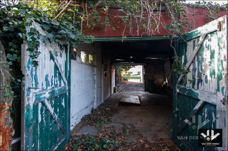 Karaktervolle, te renoveren woning op een perceel van ruim 12 aren. Ideaal gelegen nabij het centrum van Tongeren! foto 23