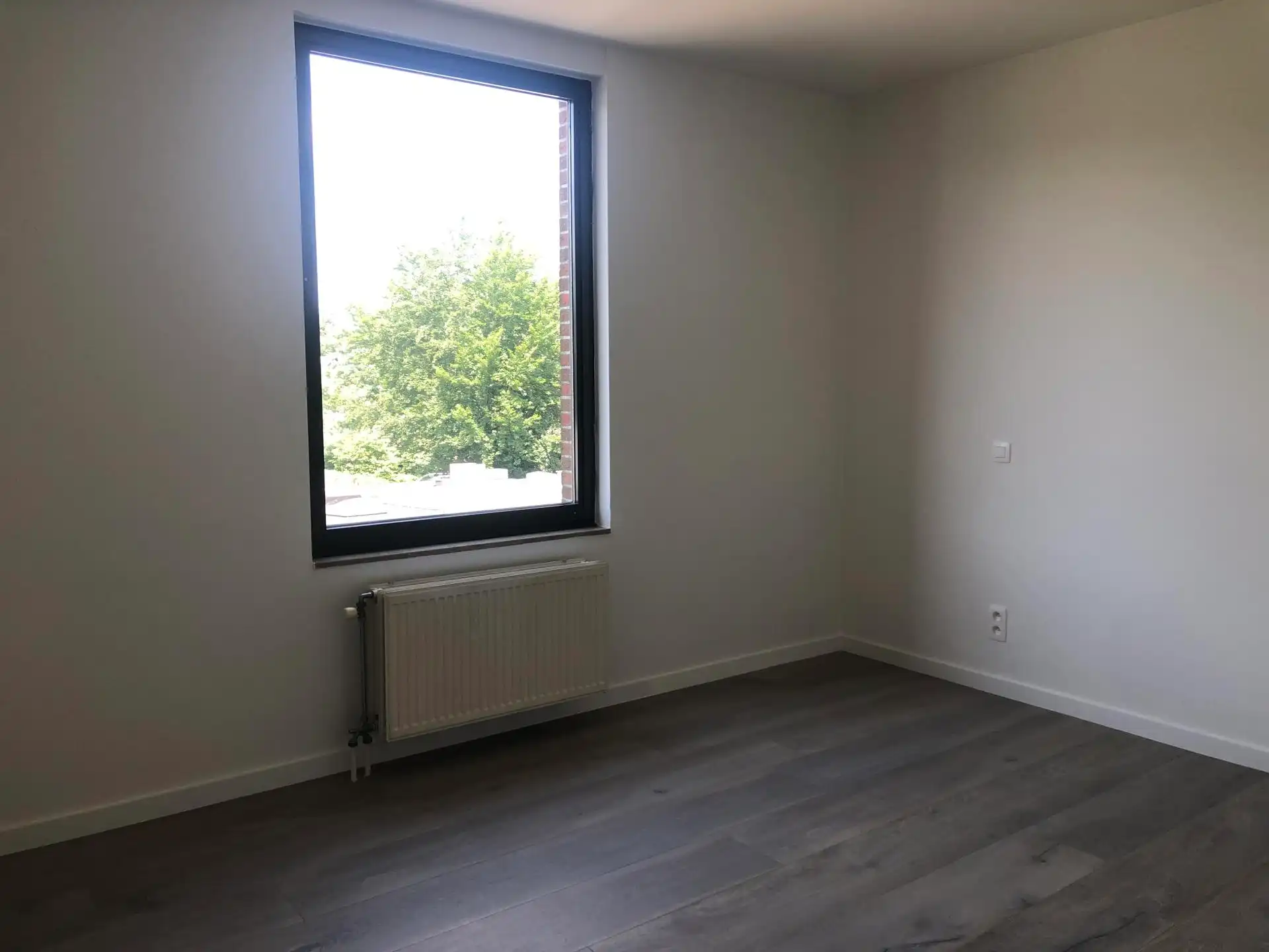 Gerenoveerd appartement te huur op de tweede verdieping in het centrum van Schilde! foto 8