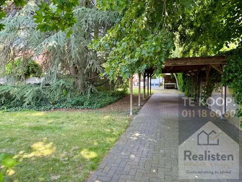 Statige burgerwoning met grote zongerichte tuin foto 10