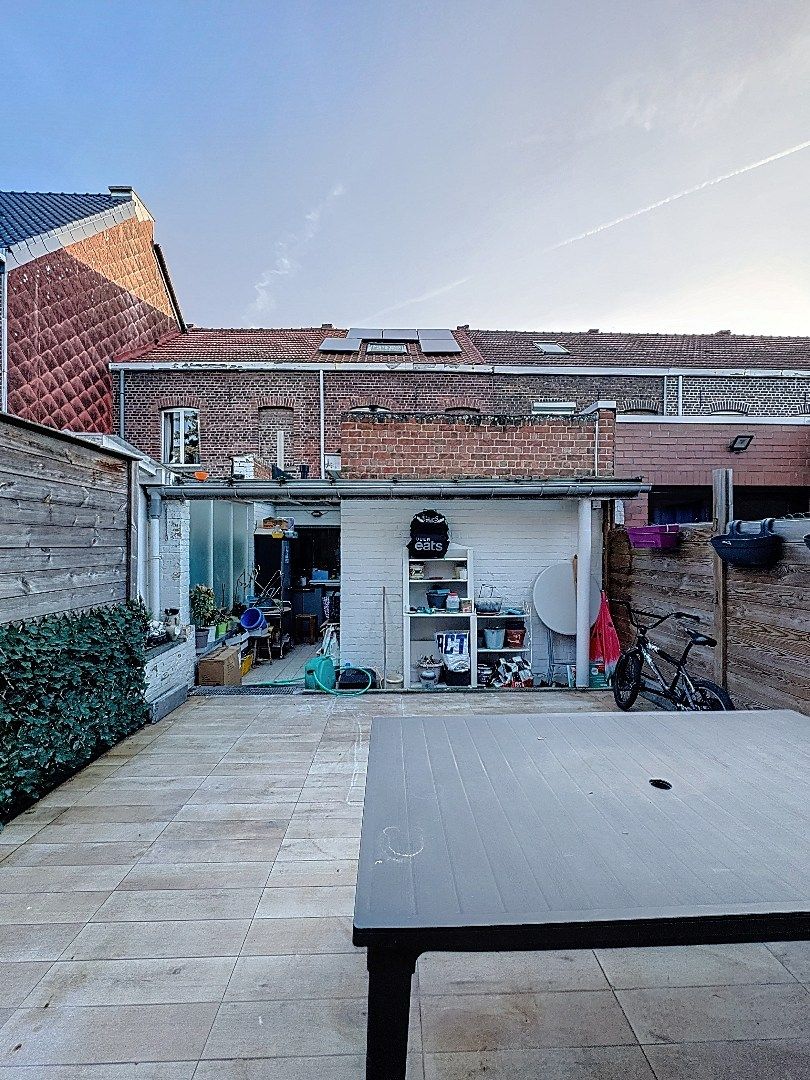Gezellig wonen in Tienen: praktische rijwoning met terras en 3 slaapkamers foto 14