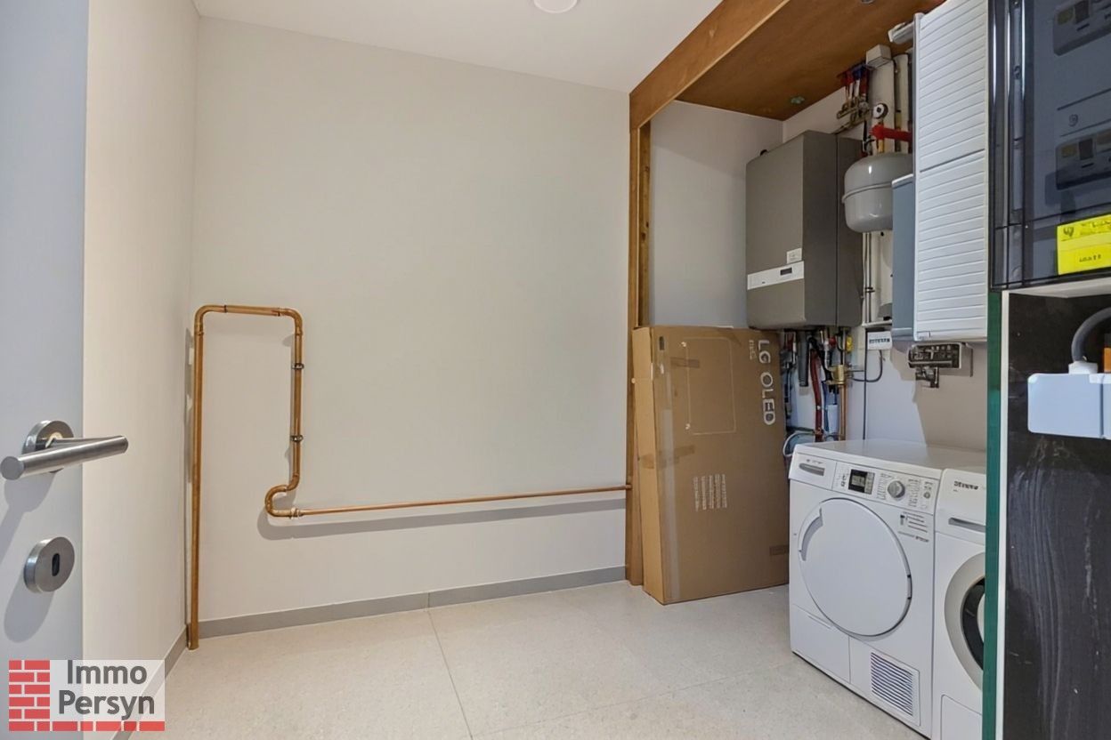 Moderne gezinswoning met 3 slaapkamers en gezellige tuin foto 20