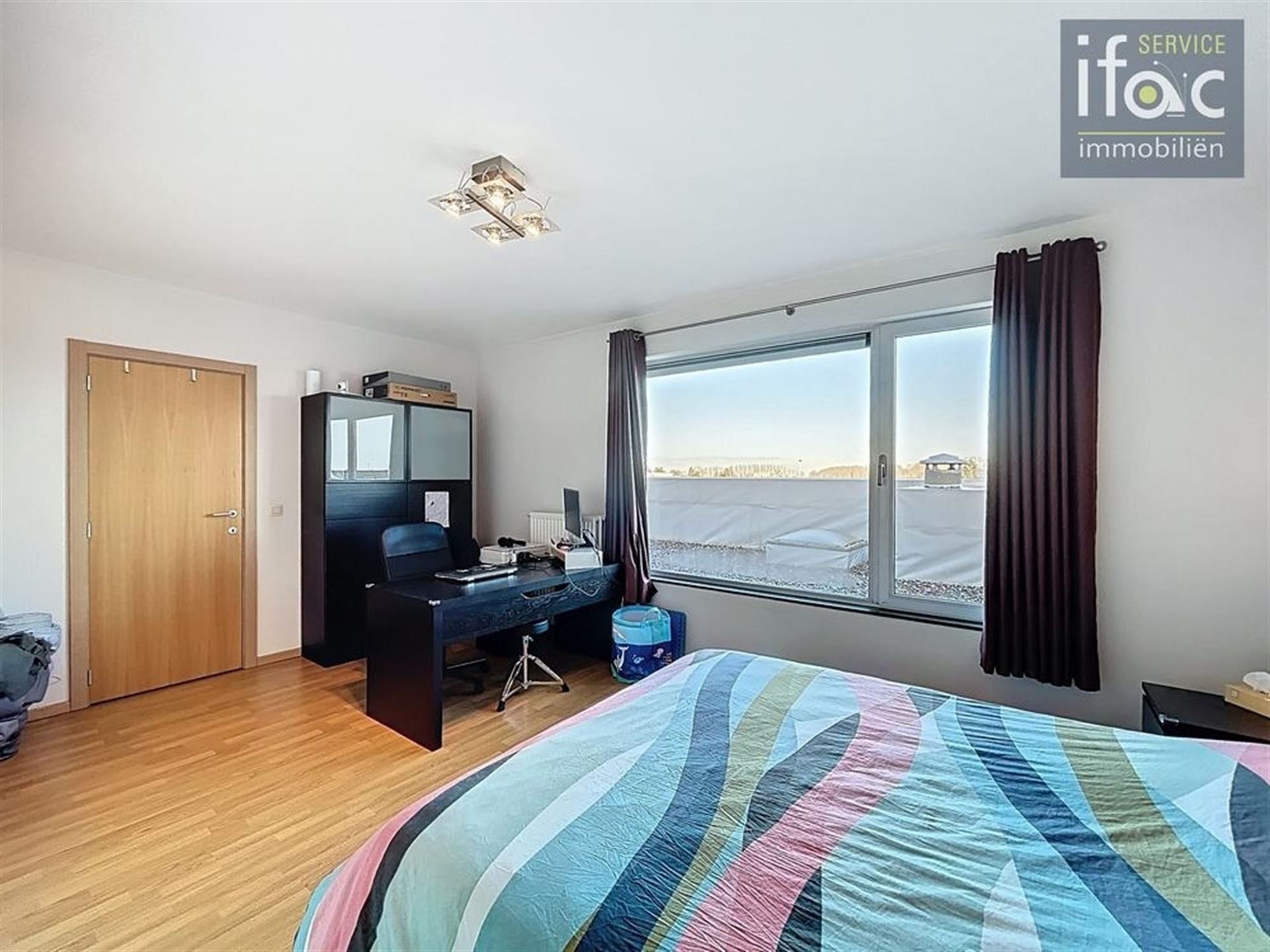 Moderne duplex met terras en parkeerplaats foto 11