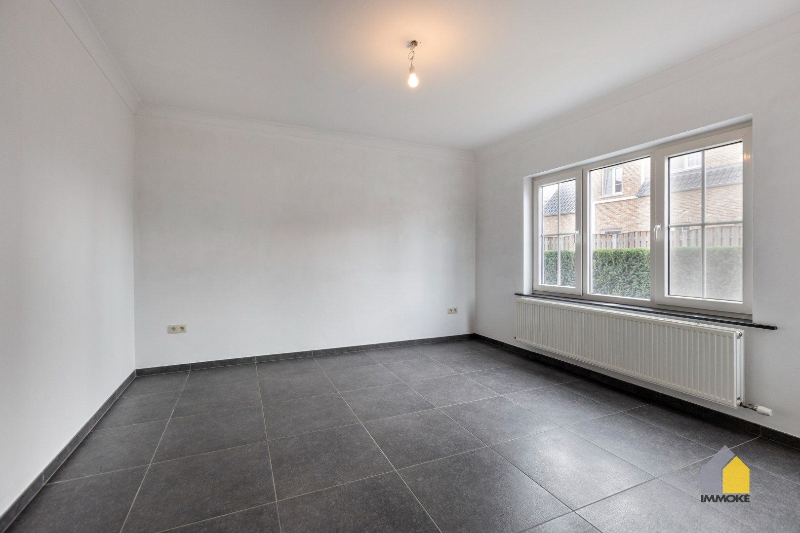 Energiezuinige woning op 3 a 14 ca met 3 slpk, 2 badkamers en knusse tuin. foto 10