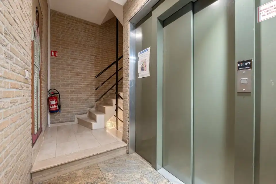 RUIM APPARTEMENT MET UITZONDERLIJK TERRAS VAN +50M² IN SINT-TRUIDEN foto 27