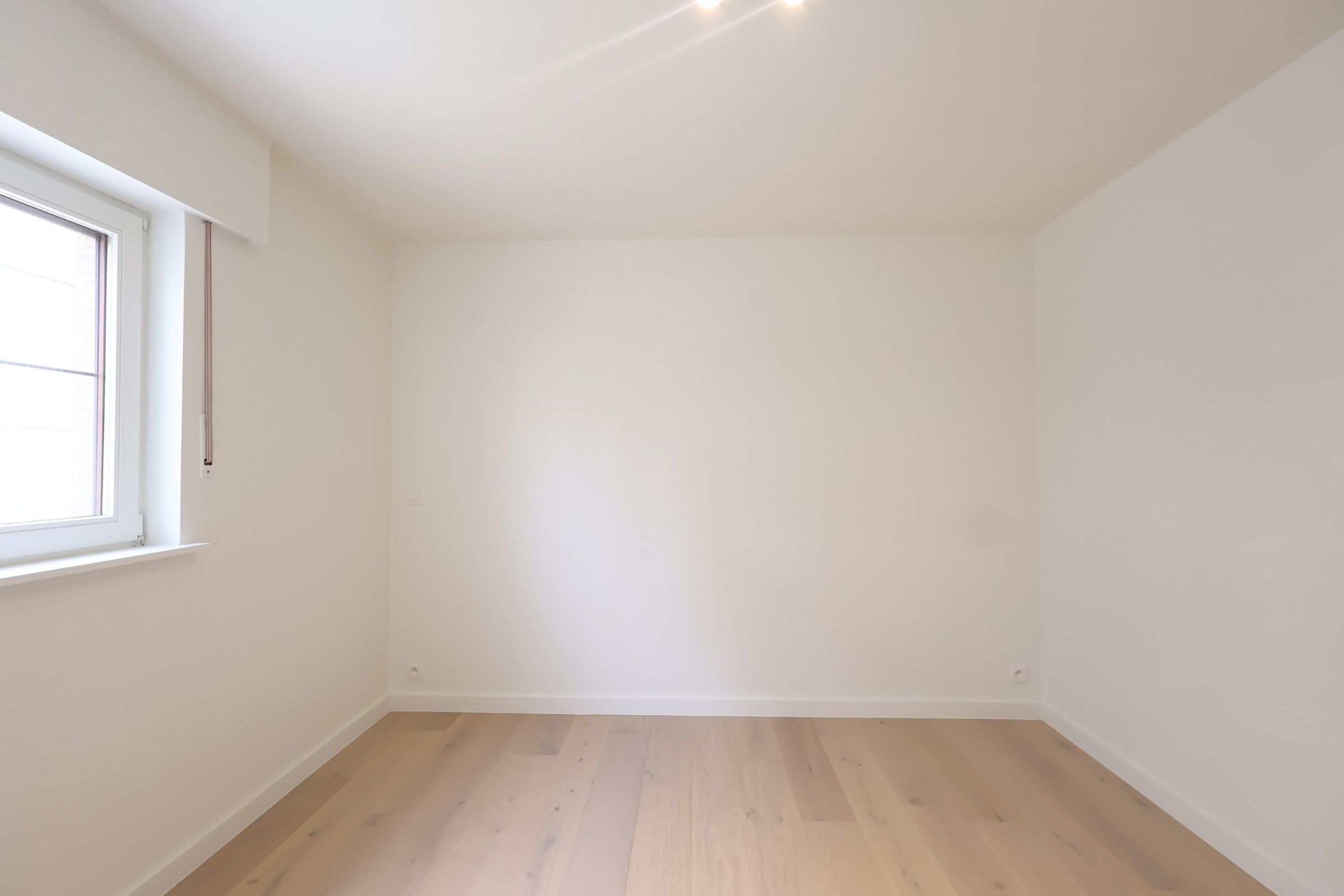 Gerenoveerd appartement met terras én garagebox vlak bij het strand van Sint-André Oostduinkerke foto 16