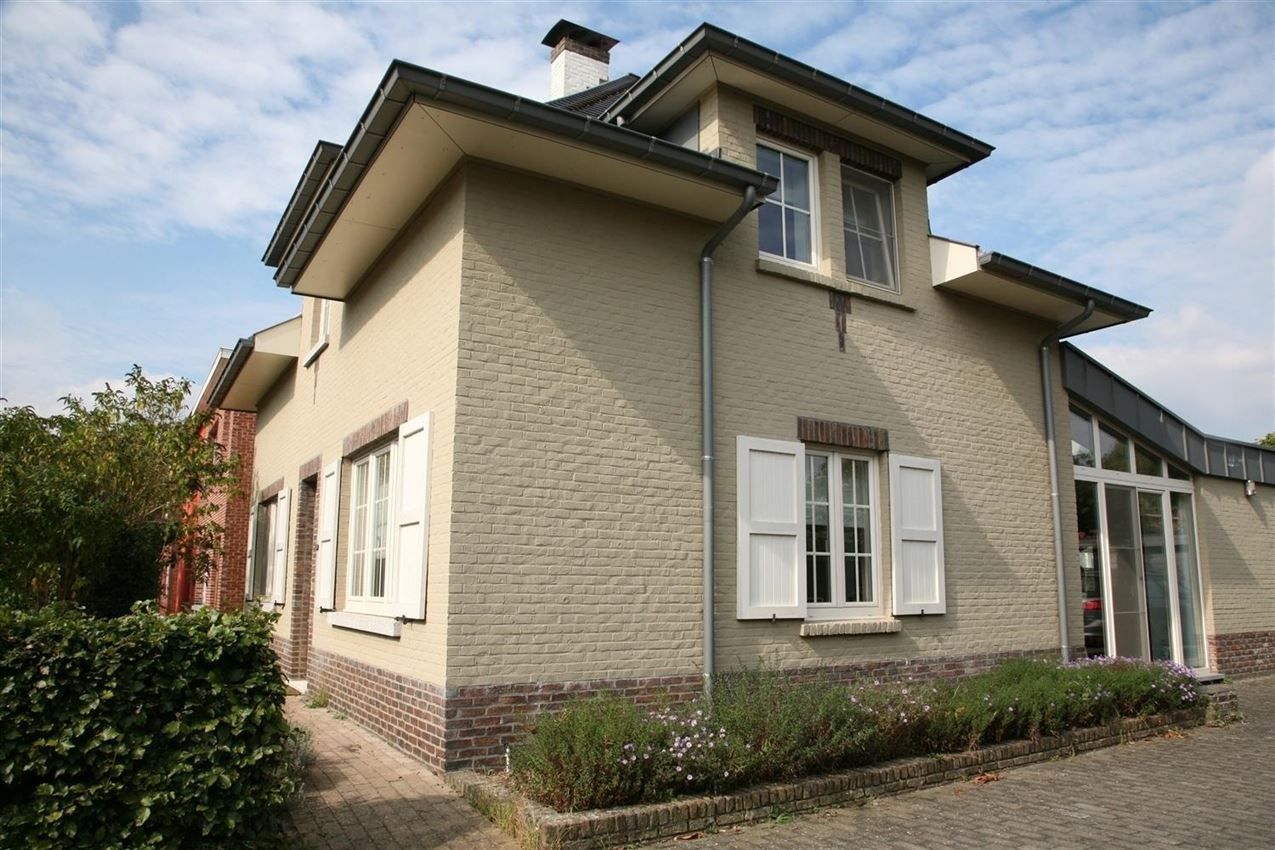 Charmante, gerenoveerde woning met 2 slpk. , tuin en garage foto 24