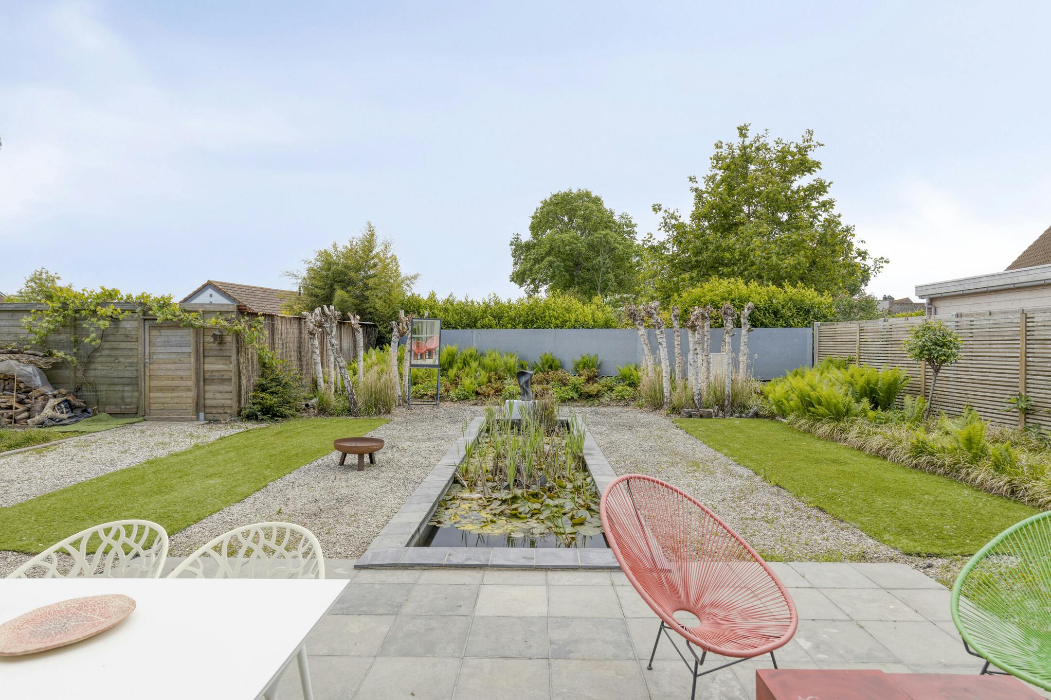 Villa met praktijkruimte op ruim perceel te koop te Brugge foto {{pictureIndex}}