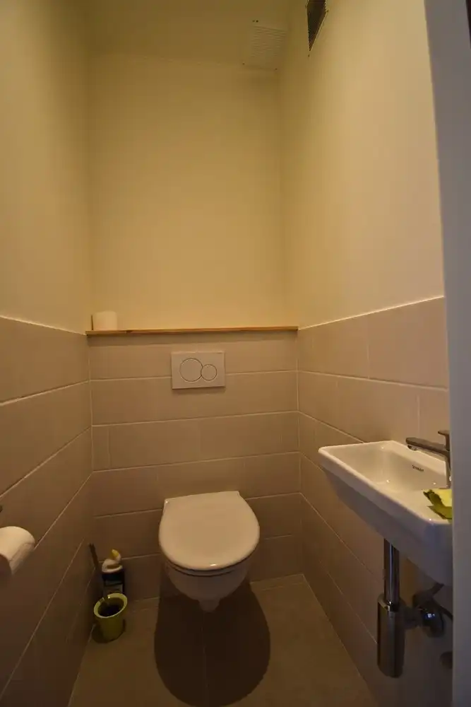 Te huur – Charmante bungalow met 2 slaapkamers, garage en tuin in rustige woonwijk te Sint-Pieters-Leeuw foto 9