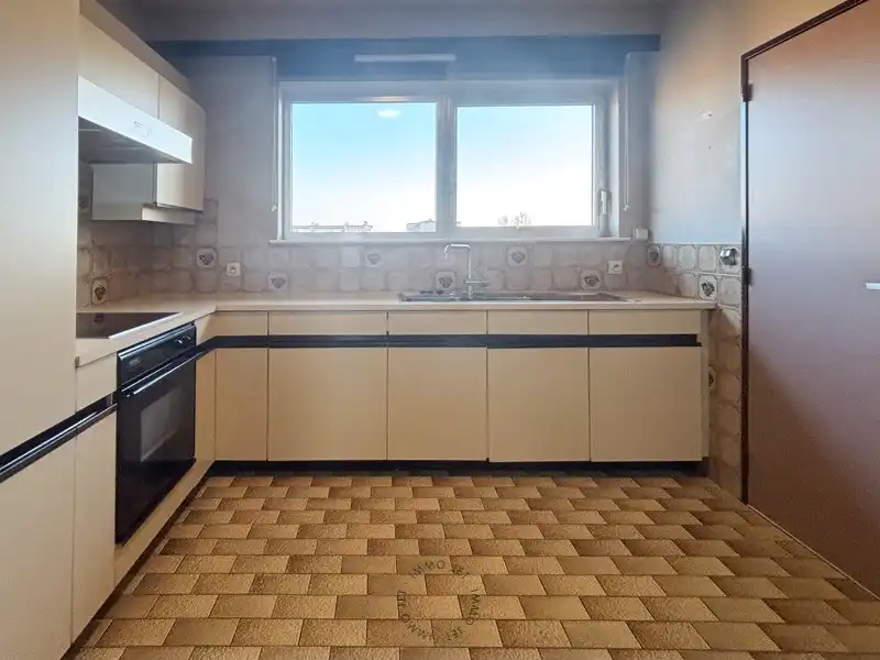 Ruim en lichtrijk appartement met 3 slaapkamers in hartje Beveren foto 7