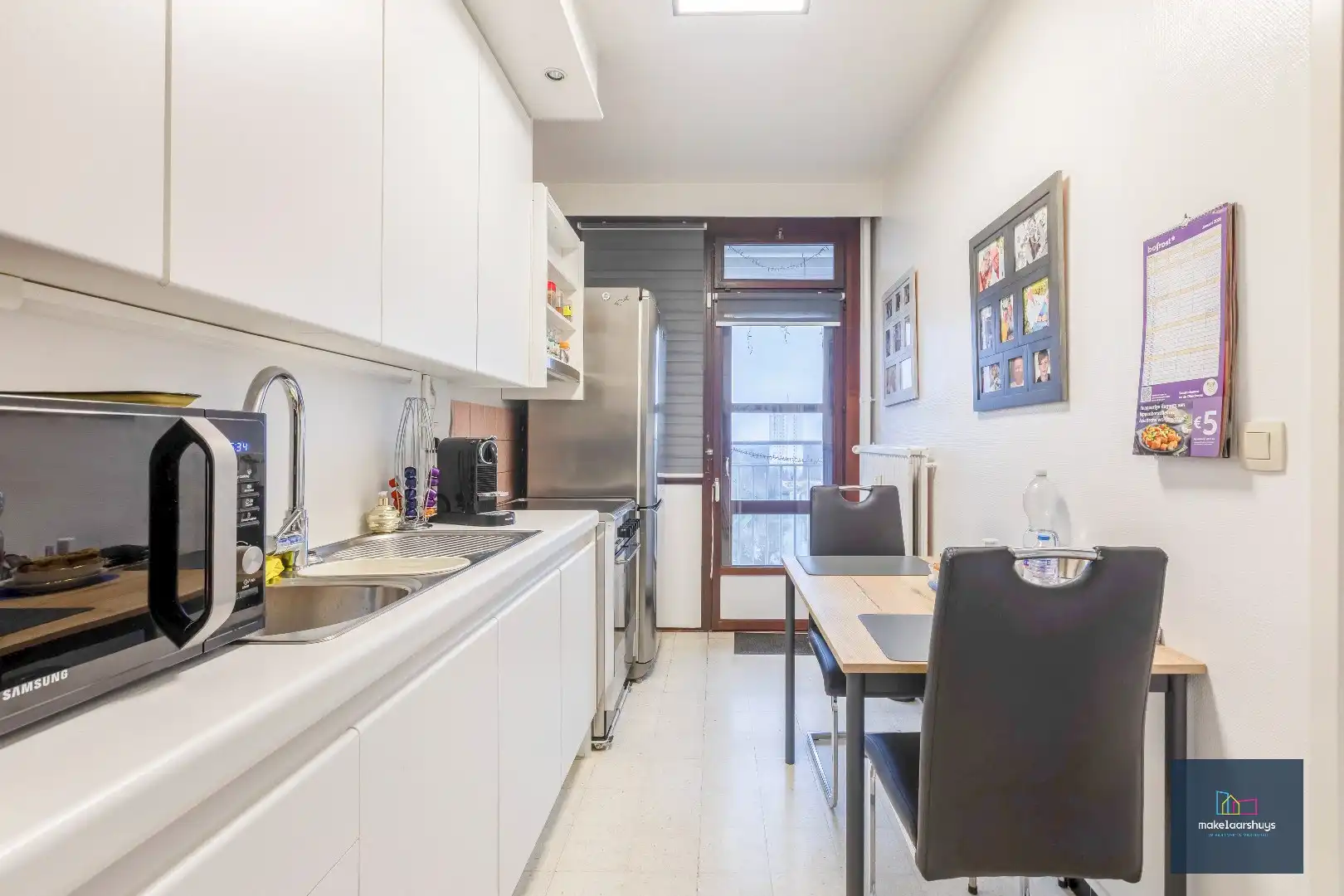 Ruim 2 slaapkamerappartement met garagebox nabij de Blaarmeersen foto 6