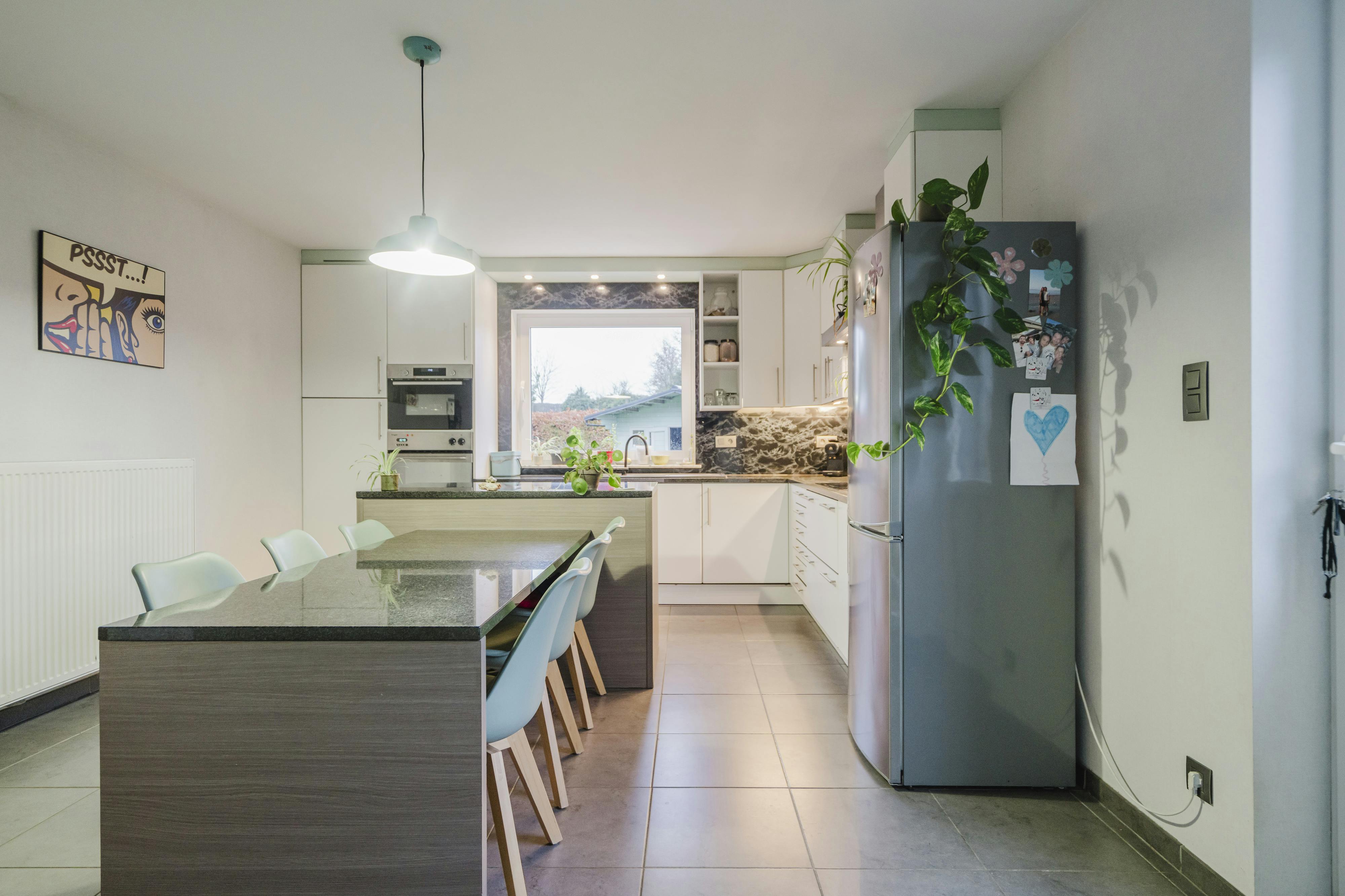 Ruime open gezinswoning met tuin in  het rustige Brakel foto 4