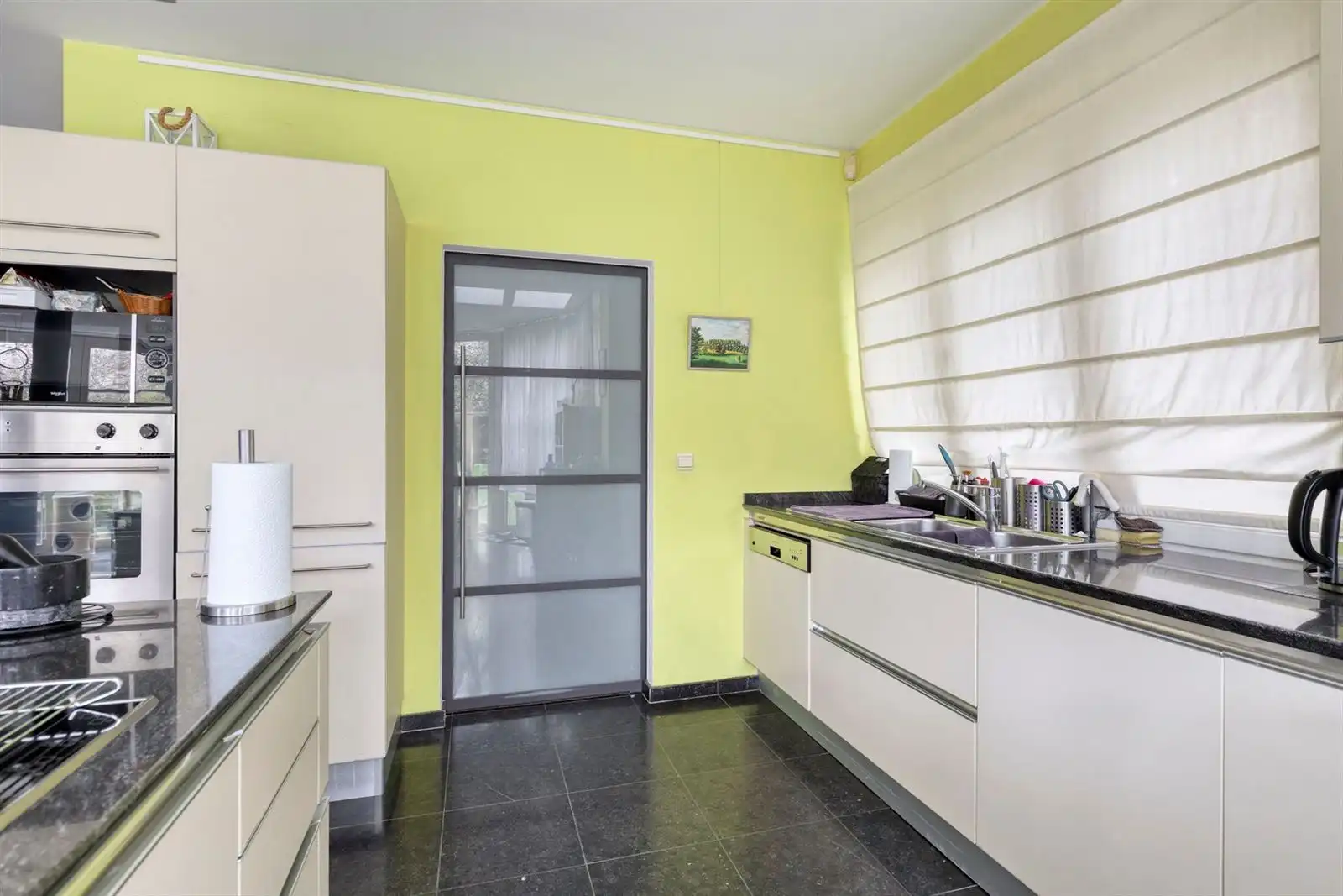 Gelijkvloers appartement (159m²) met prachtige tuin foto 8