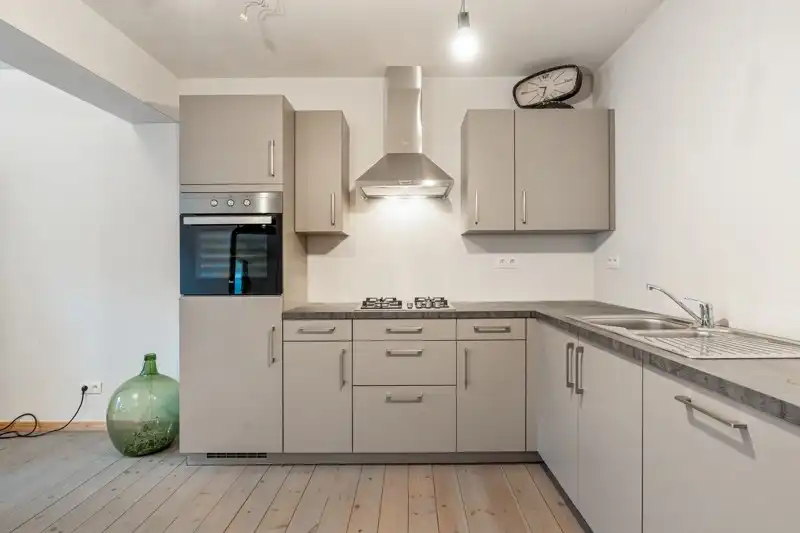 Handelsruimte met woonappartement in het centrum van Wommersom foto 13