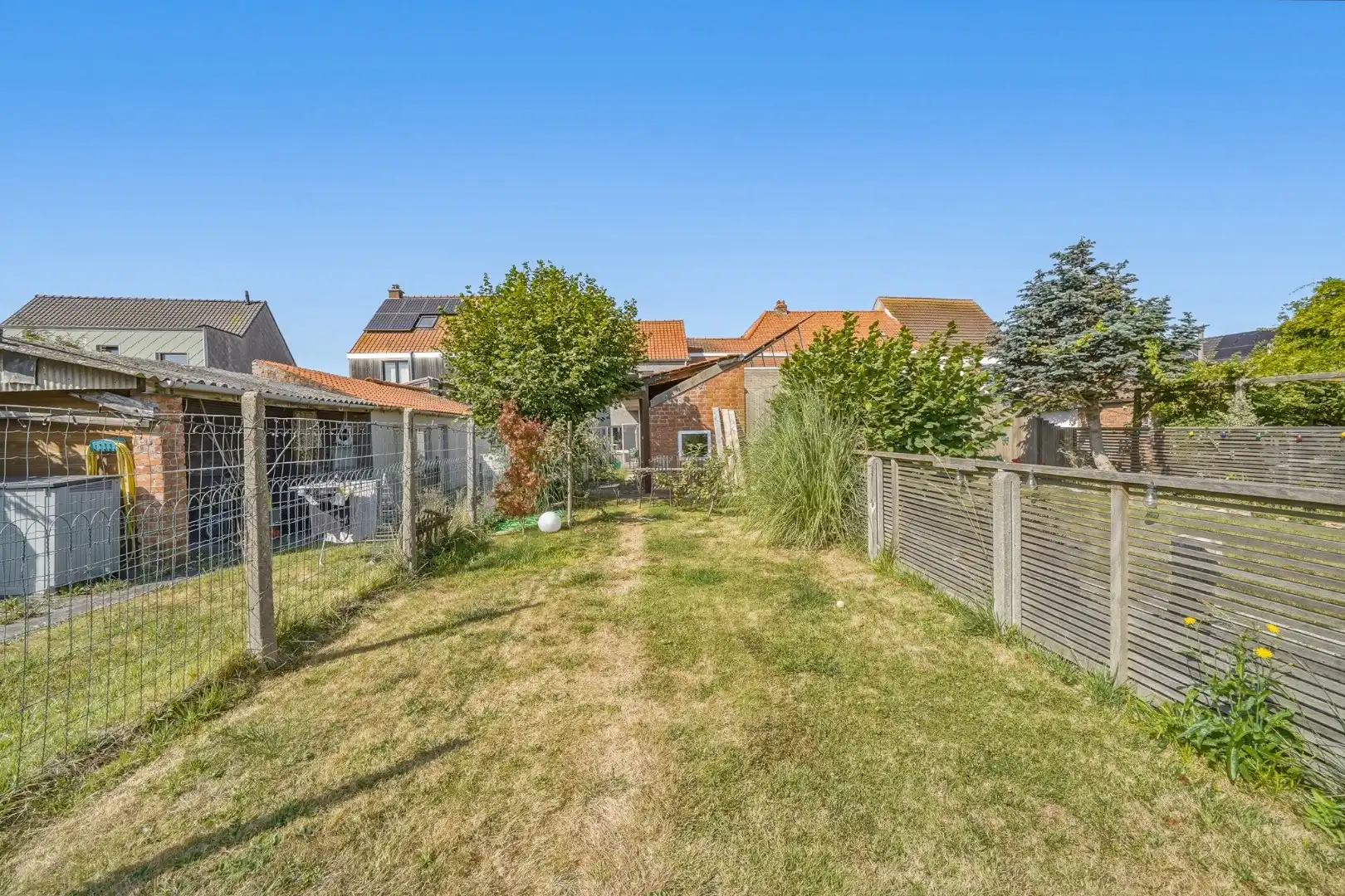 Te renoveren woning met ruime tuin in Bredene foto 9