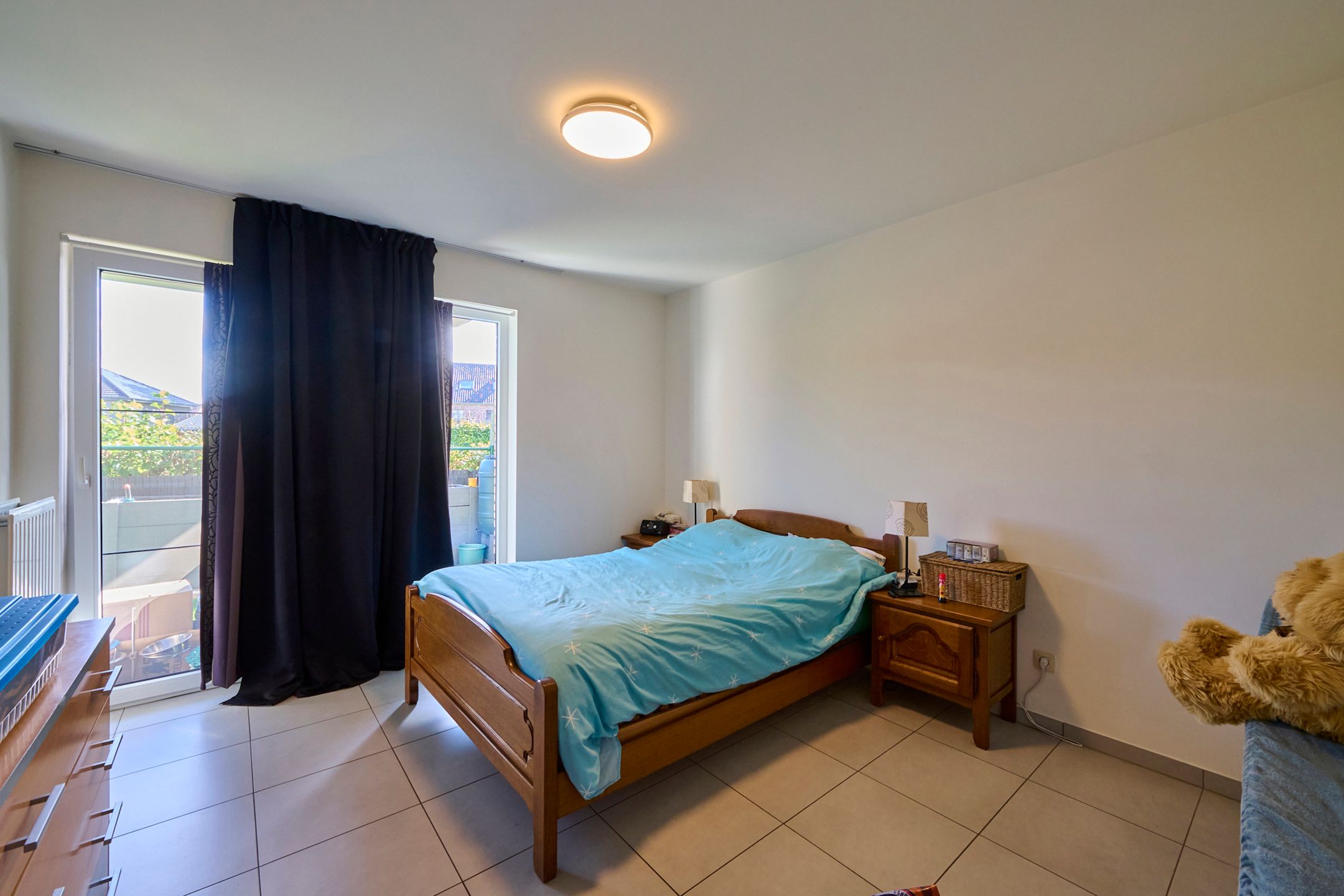 Instapklaar, gelijkvloers appartement met 2 slaapkamers, ruim terras en parking foto 8