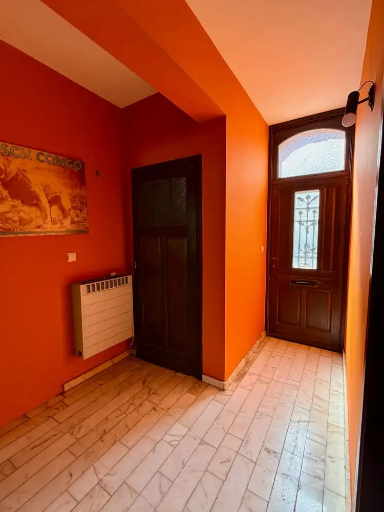 Ruime rijwoning met 4 slaapkamers, garage en tuin op toplocatie in Heverlee foto 3