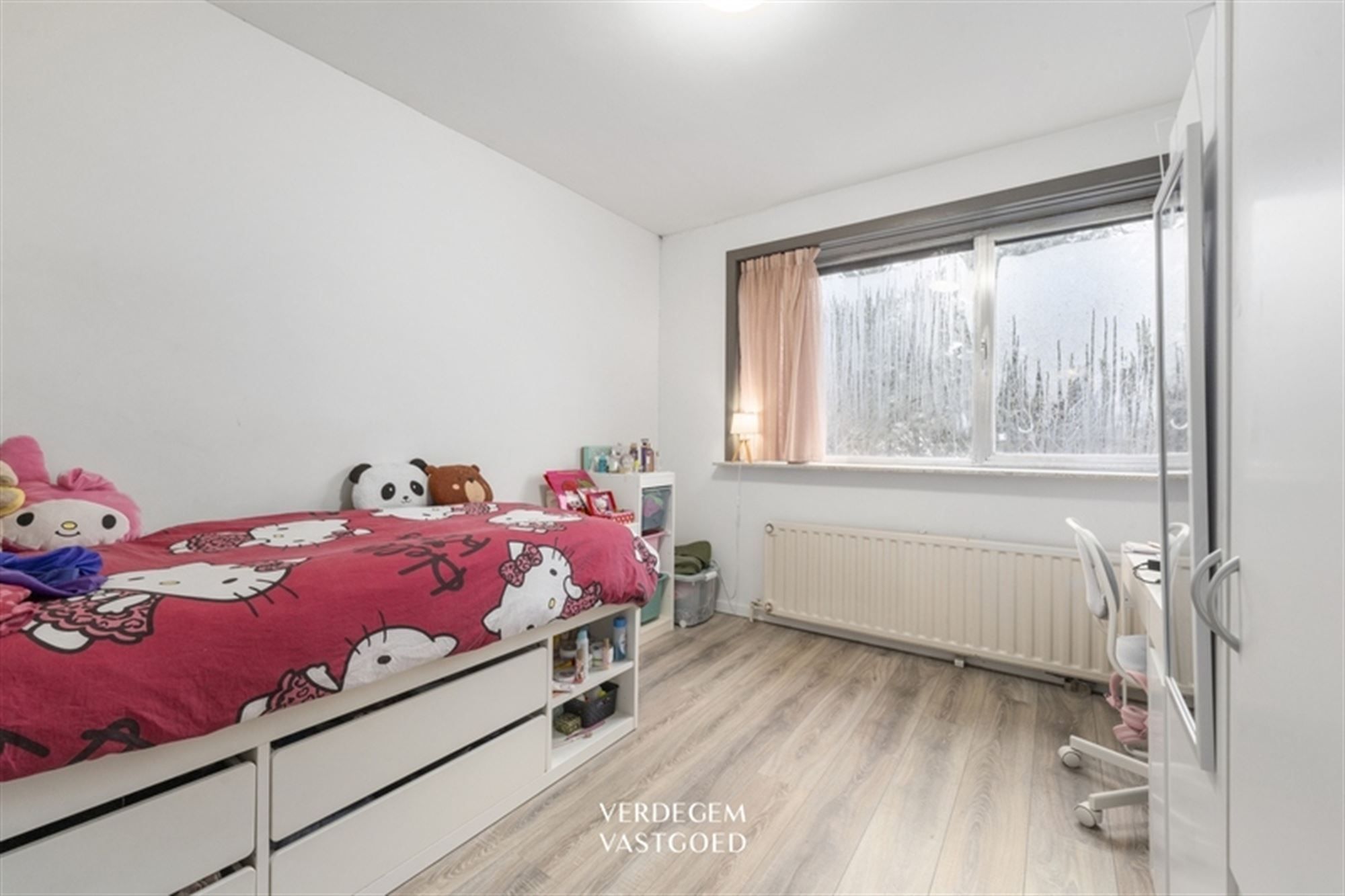 Ruime woning met 5 slaapkamers, zuidwestgerichte tuin en inpandige garage met oprit in een rustige straat foto 15