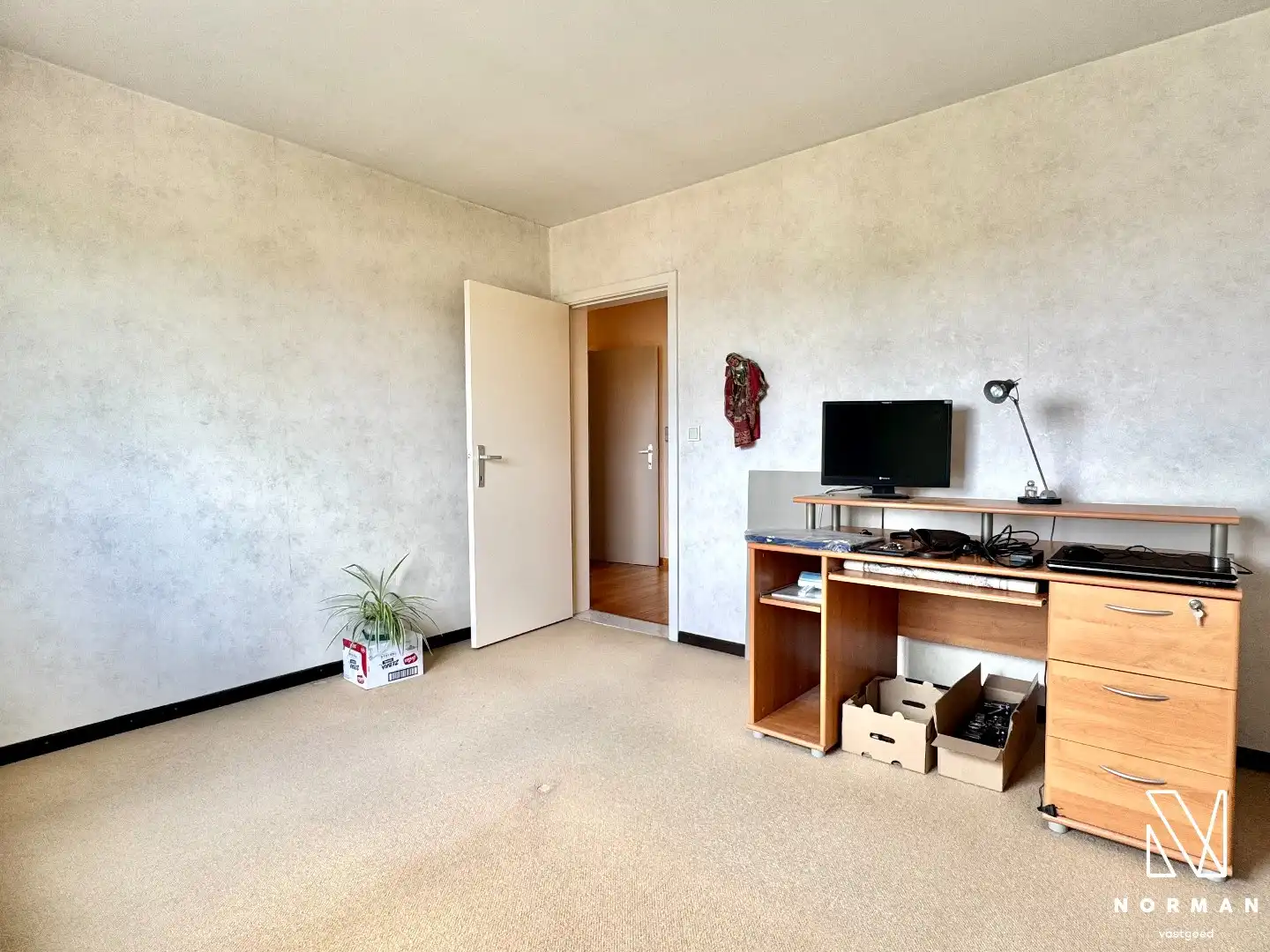 Instapklaar 2-slaapkamer appartement inclusief autostaanplaats en terras te koop in Kuurne! foto 8