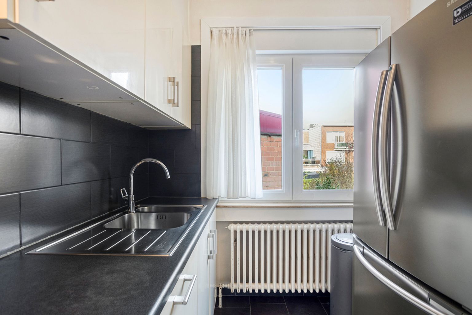 Gerenoveerde bel-étage woning met garage foto 19