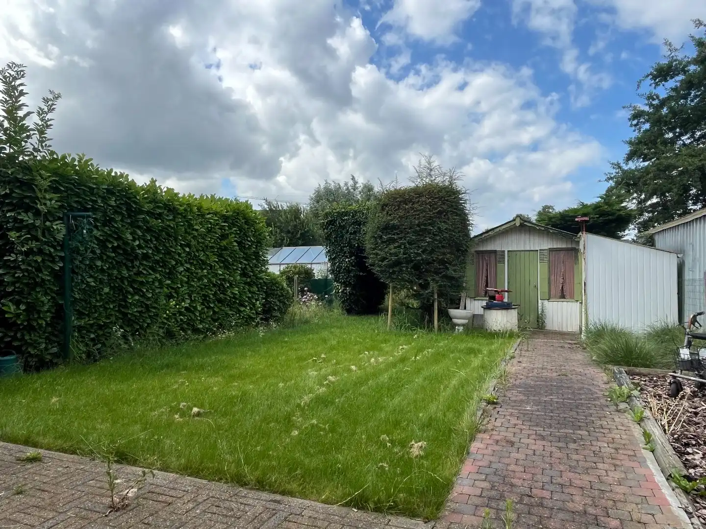 Rijwoning met 5 slaapkamers, garage en zuid-west gerichte tuin. foto 12