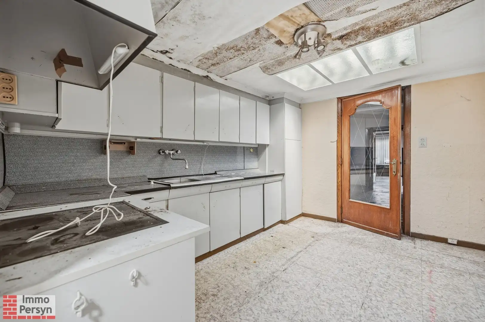 Te renoveren rijwoning met tuin in hartje Zichem foto 5