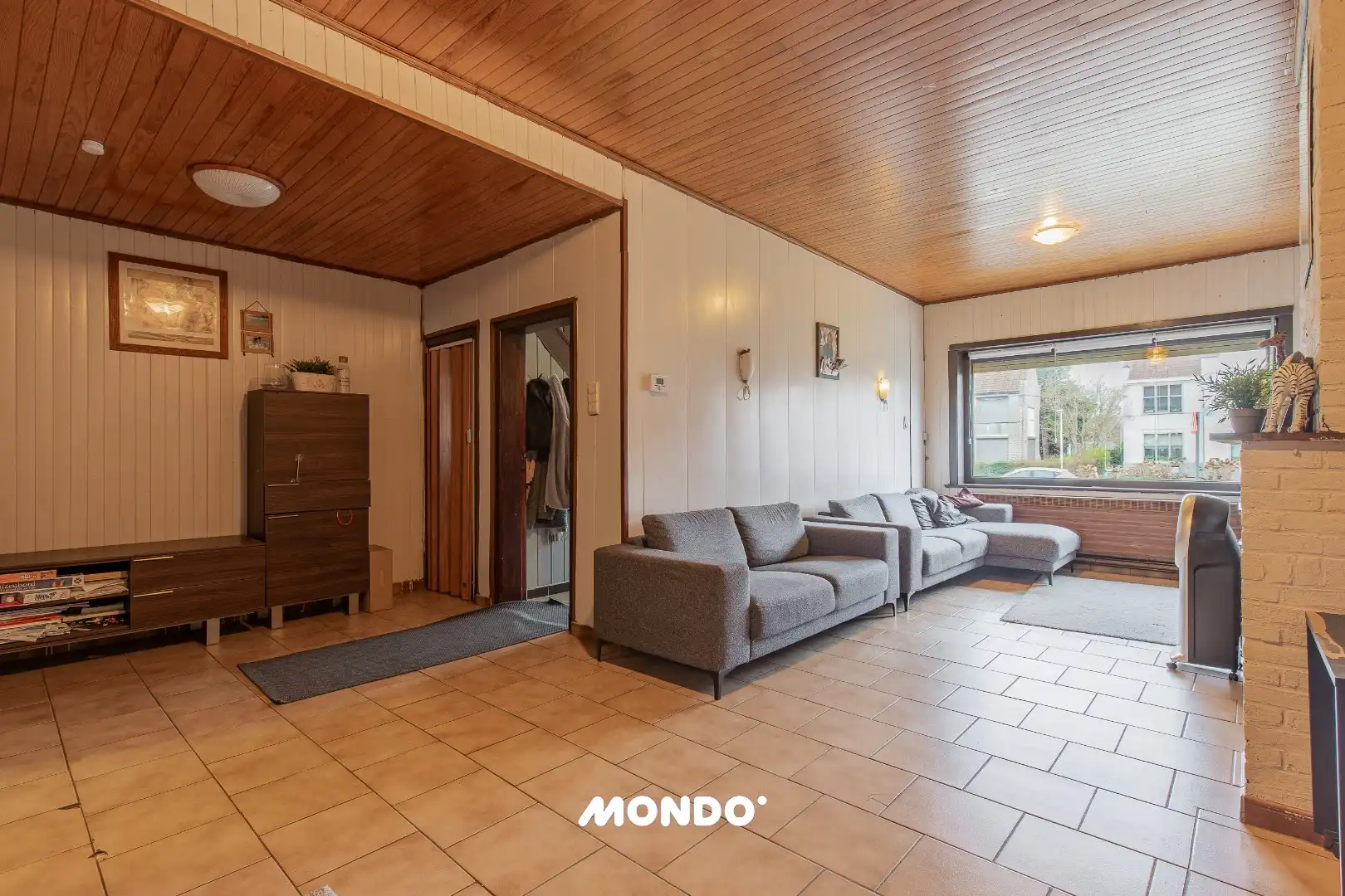 Deels gerenoveerde gezinswoning met 5 à 6 slaapkamers en tuin met achteruitweg foto 3