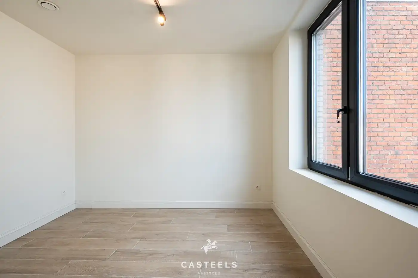Ruime duplex met zonnig terras te Zelzate te koop foto 17