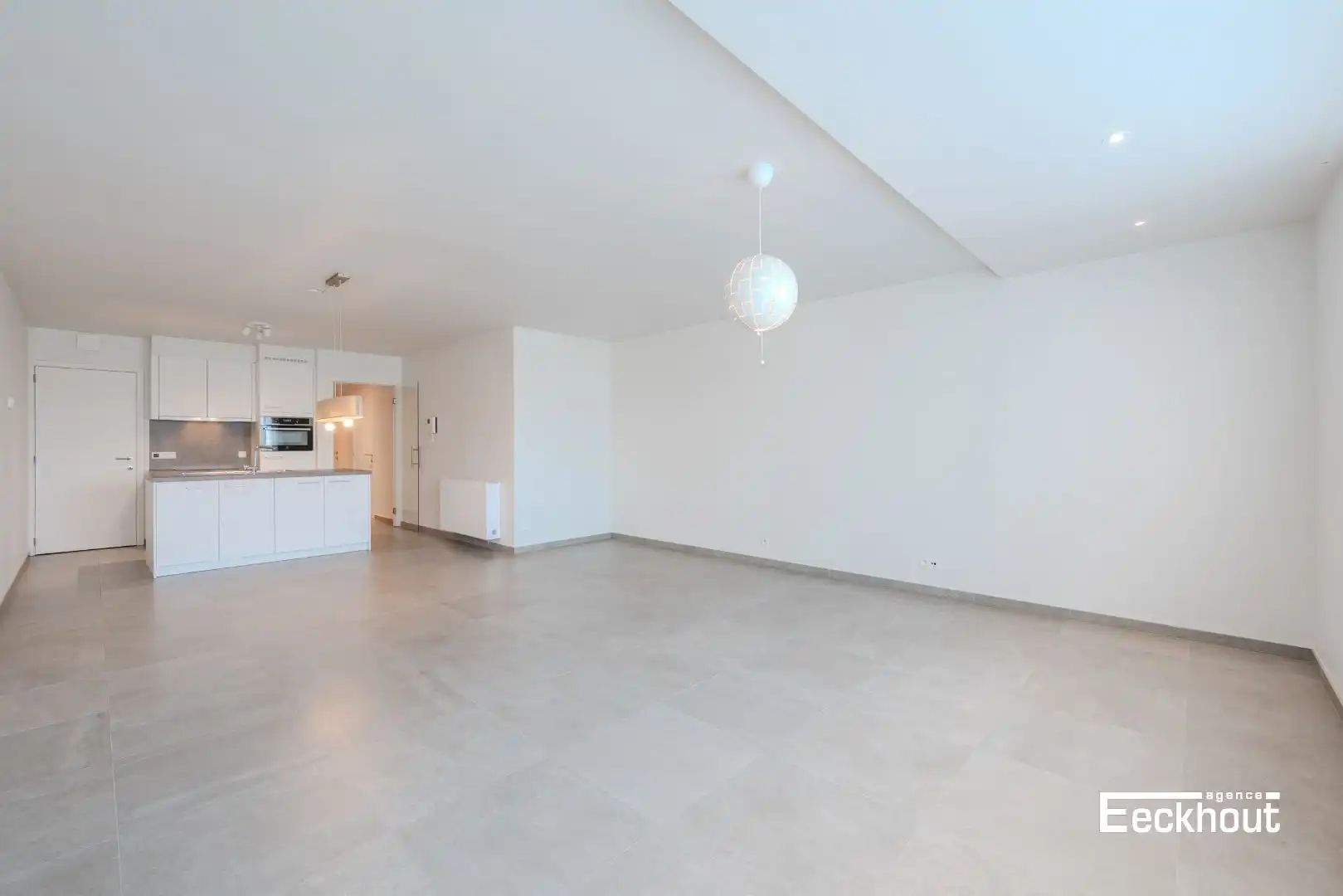 Ruim gelijkvloersappartement met zonneterras en tuin in recent gebouw! foto {{pictureIndex}}