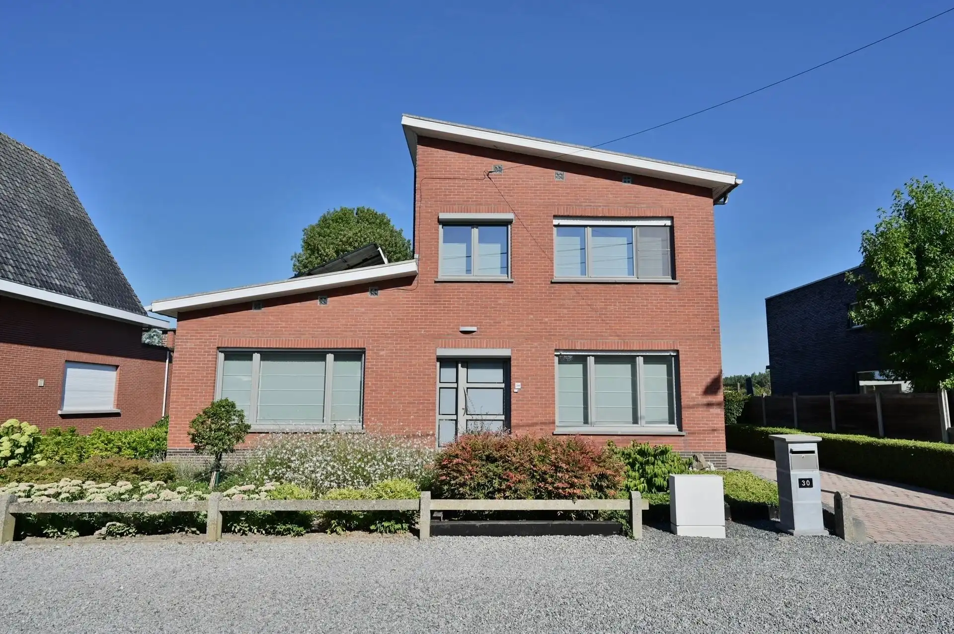 Tijdloze woning met uitzonderlijke troeven te Boortmeerbeek foto {{pictureIndex}}