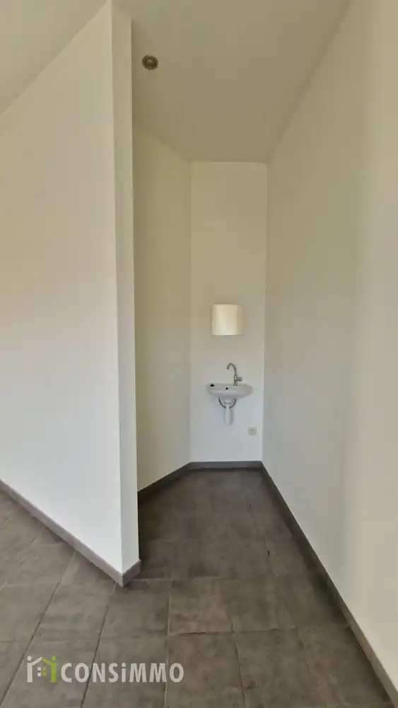 Woonst met handelspand op centrale ligging in Genk-Bret foto 28