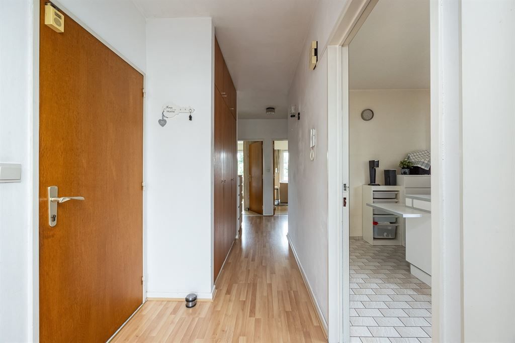 Woning vol potentieel met grote zonnige tuin foto 6
