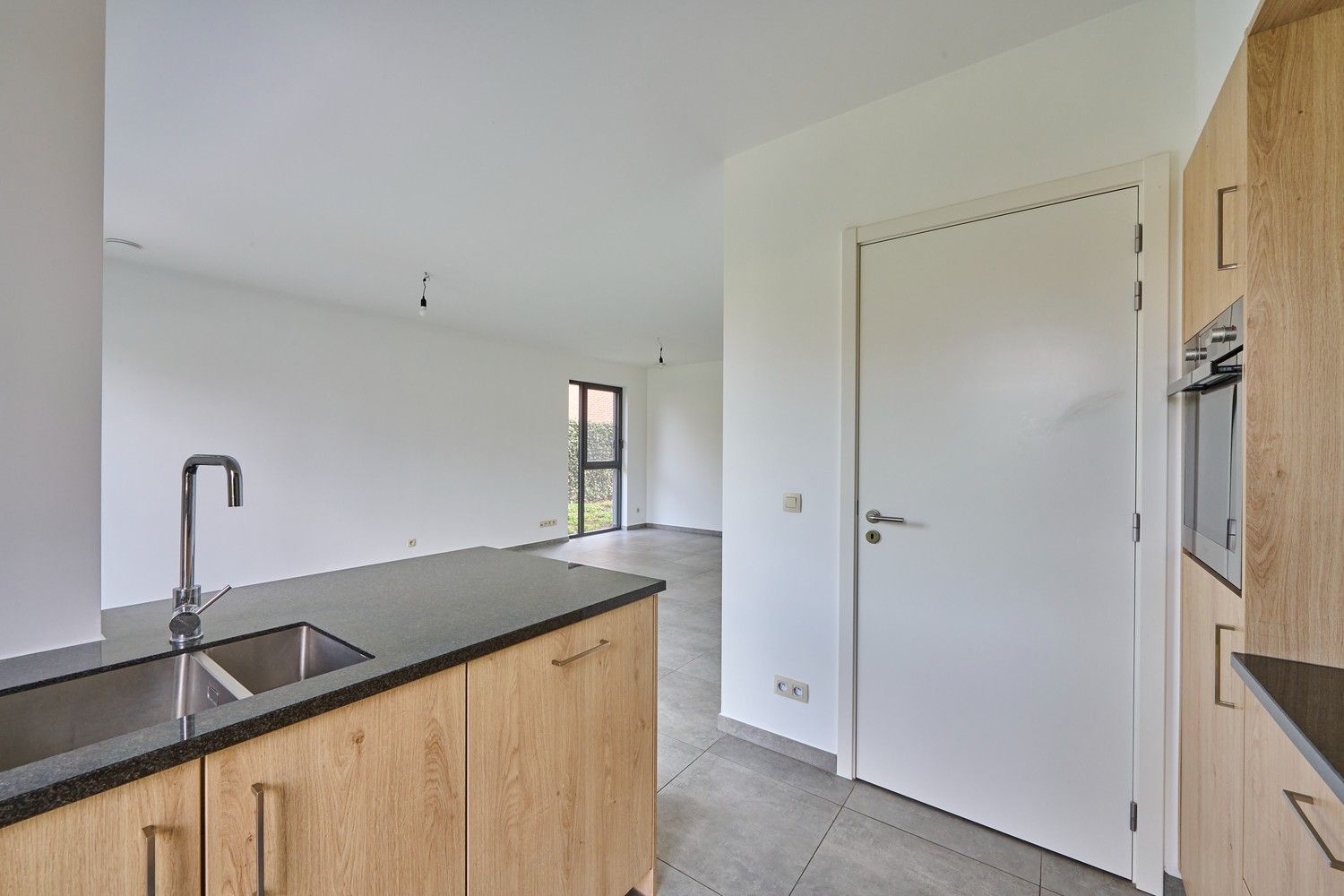 Stijlvol gelijkvloers appartement met zongerichte tuin - EPC 12! foto 9