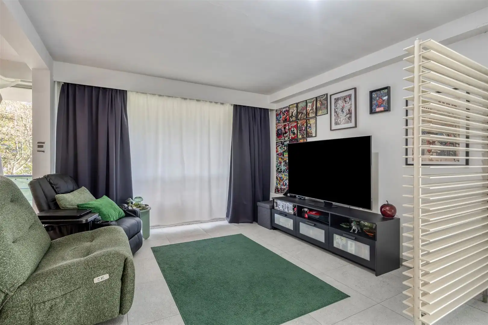 TE KOOP: Gerenoveerd appartement met 2 slaapkamers, terras en garage te Heusden! foto 5